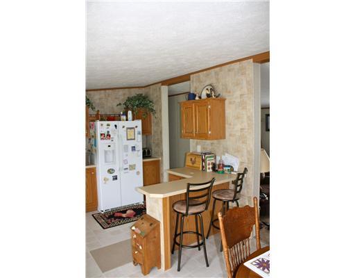 76 Henderson Road Easton, ME 04740 - Photo 13 of 25 Kitchen. Breakfast bar for your...