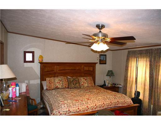 76 Henderson Road Easton, ME 04740 - Photo 15 of 25 Master Bedroom. Spacious master...