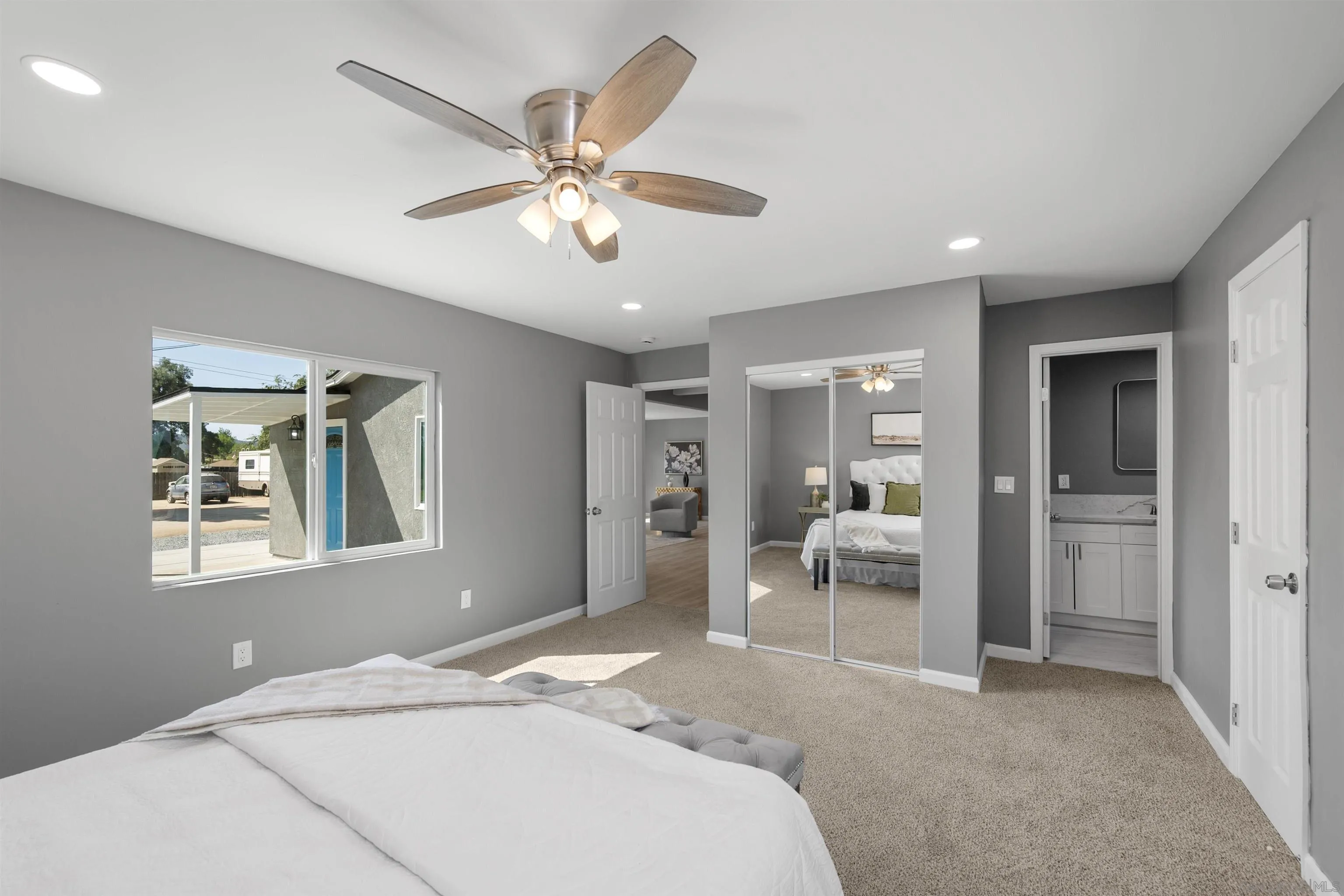 2235 Toub Street Ramona, CA 92065 - Photo 16 of 33 a bedroom with a bed and glass door