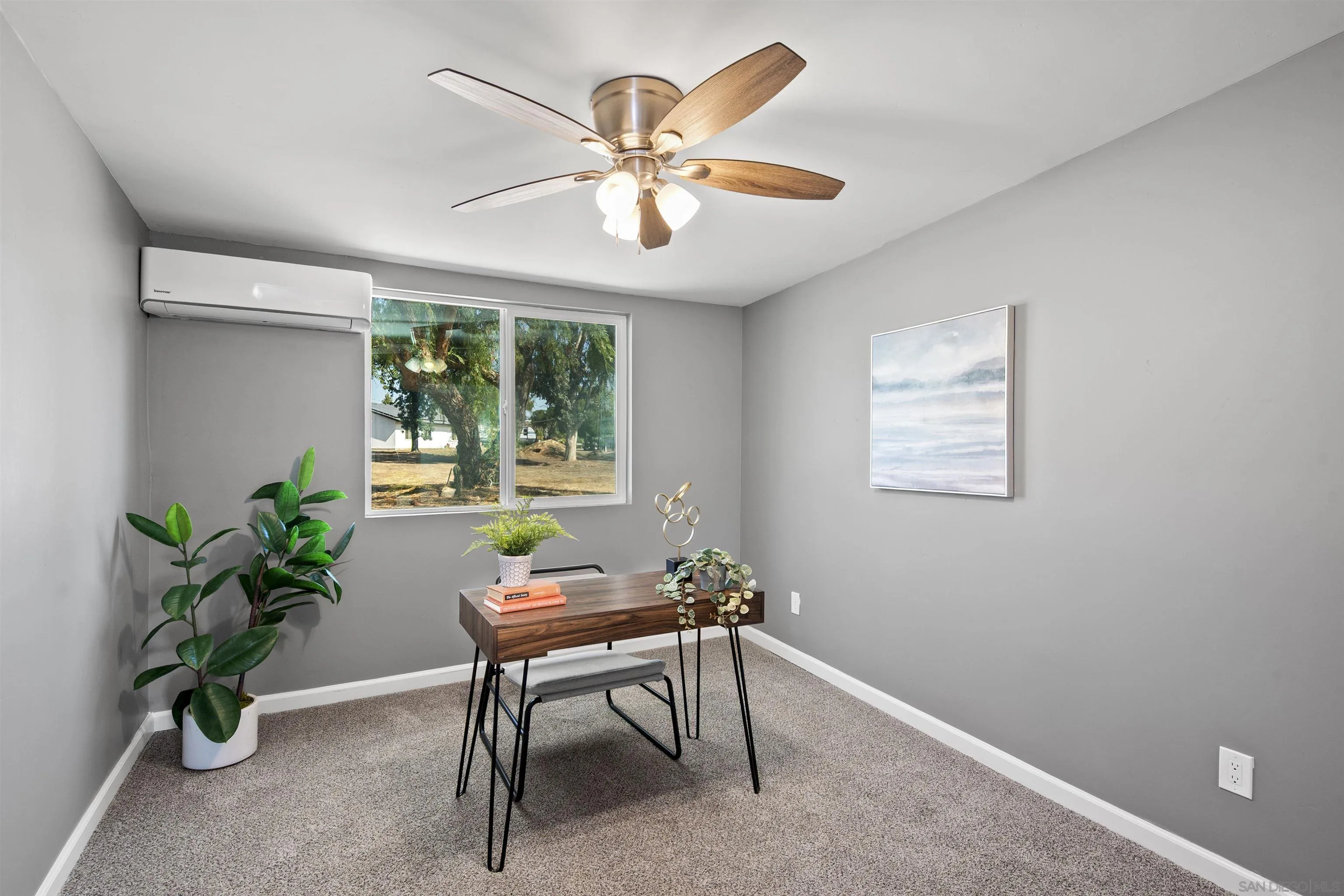 2235 Toub Street Ramona, CA 92065 - Photo 19 of 33 a workspace with furniture and a potted plant
