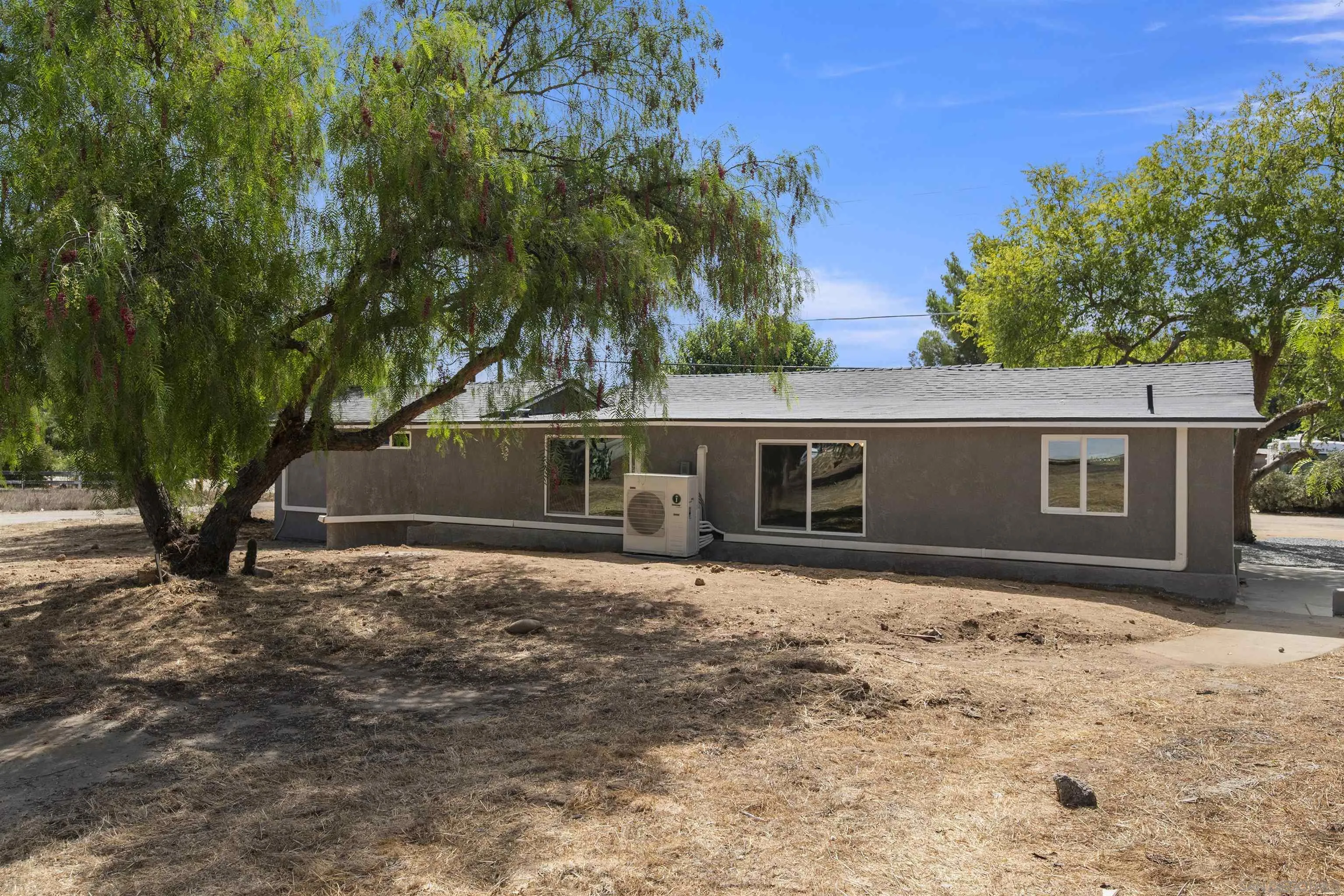 2235 Toub Street Ramona, CA 92065 - Photo 31 of 33 a view of a house with a yard