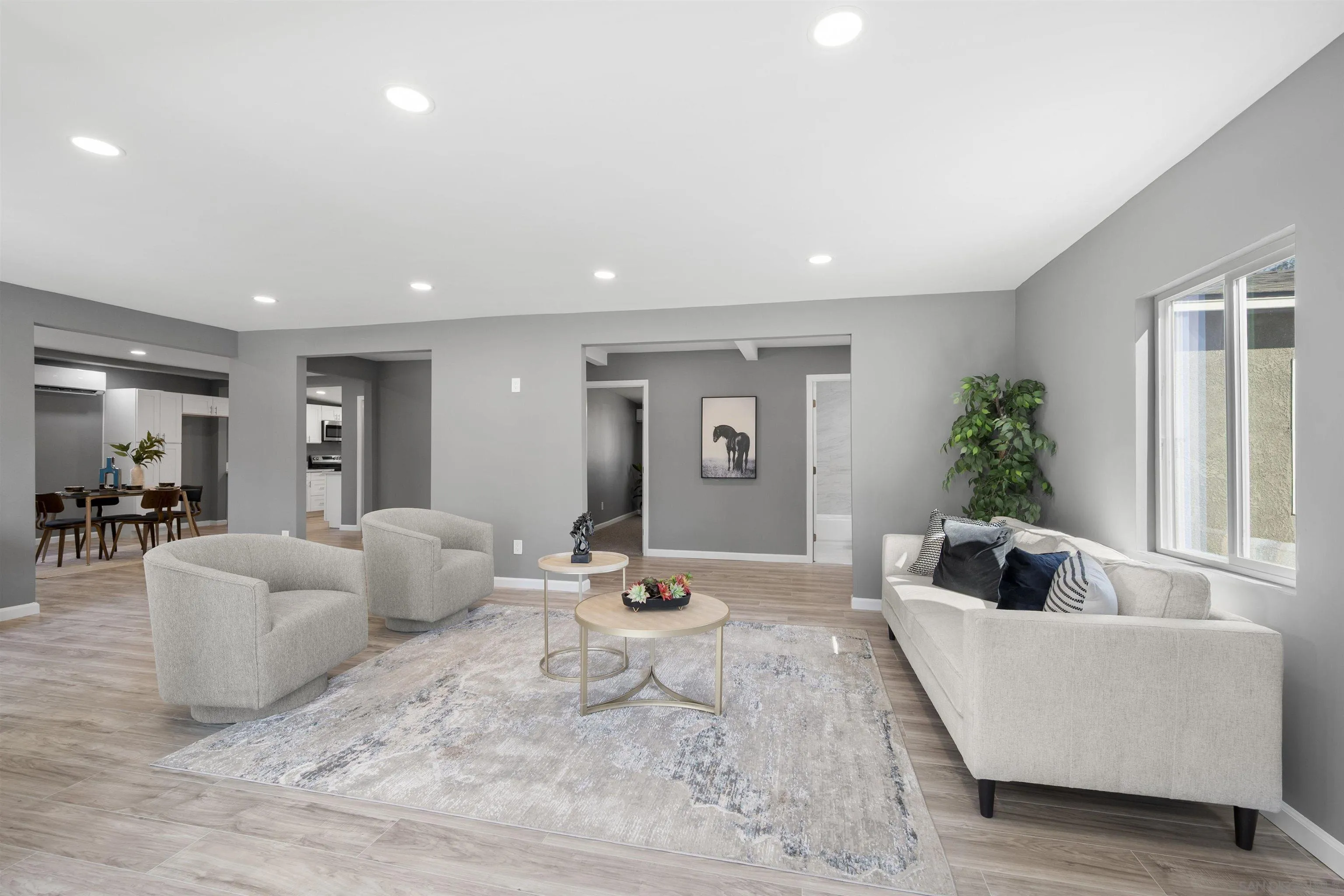 2235 Toub Street Ramona, CA 92065 - Photo 5 of 33 a living room with furniture potted plant and white walls