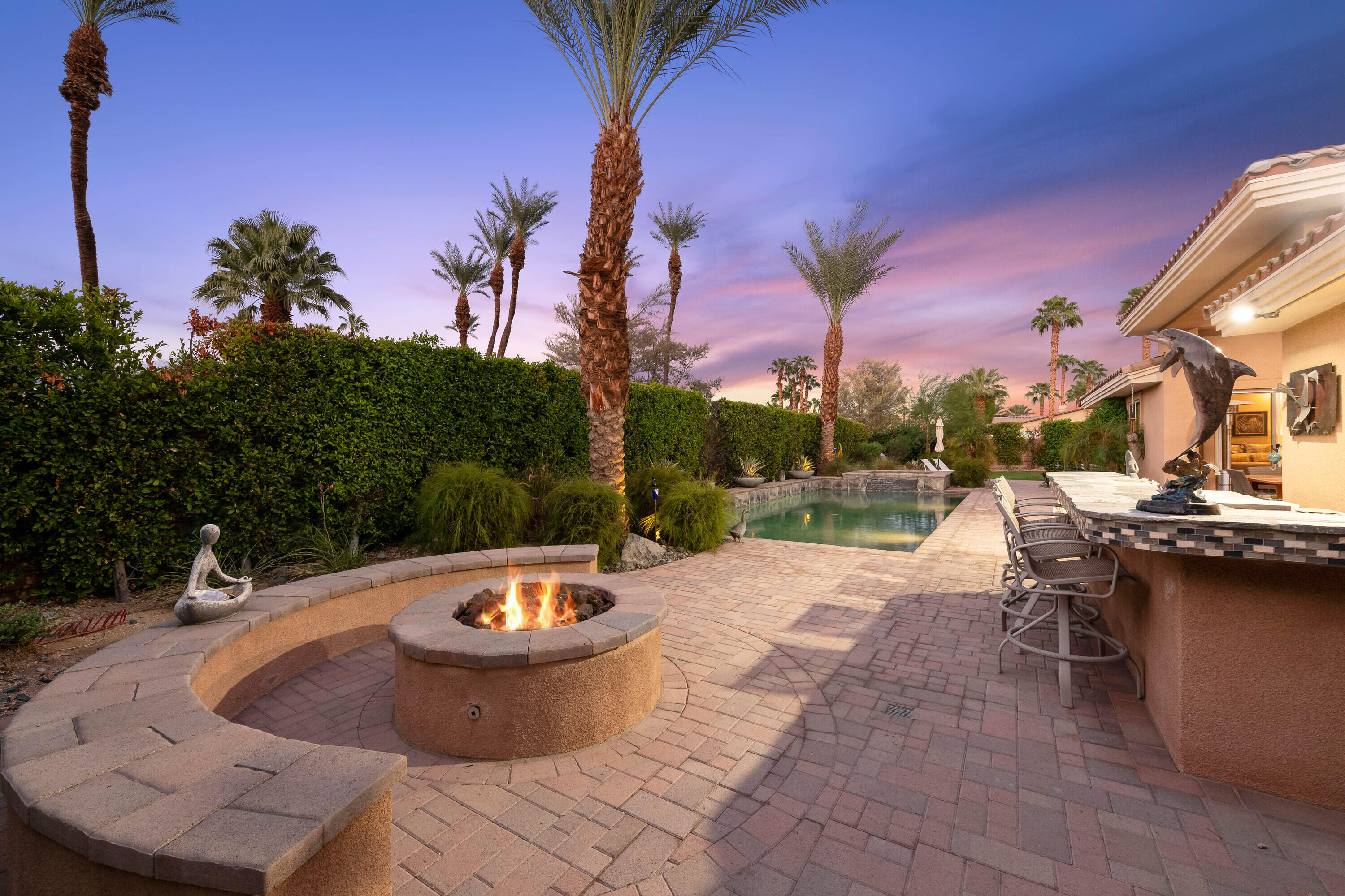 1 Varsity Circle Rancho Mirage, CA 92270 - Photo 46 of 50 Firepit at twilight