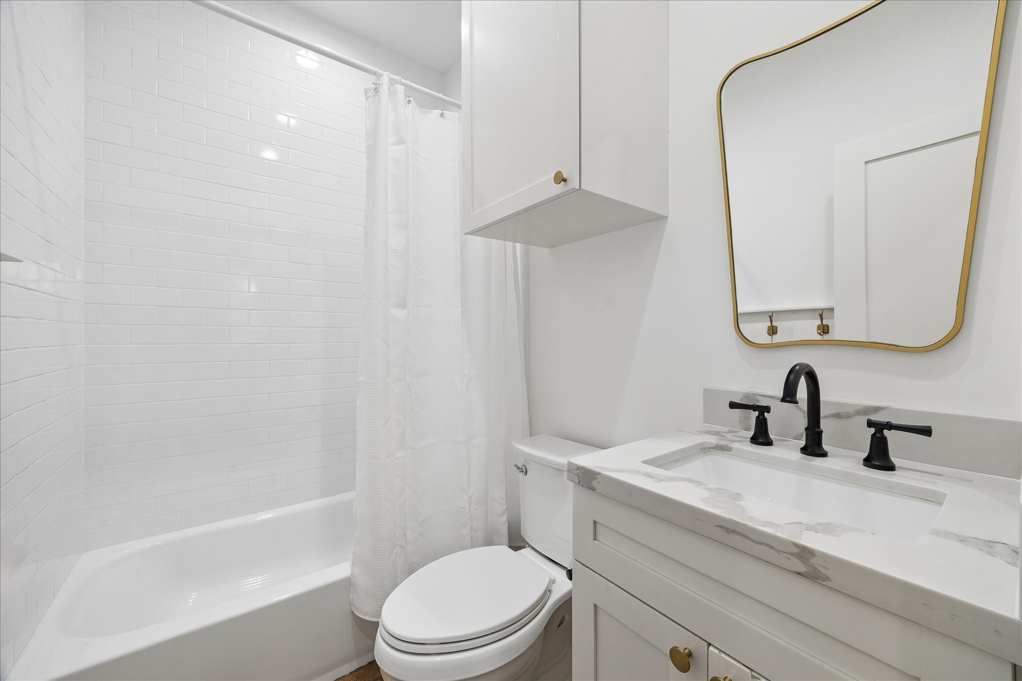 1205 Temple Street Houston, TX 77009 - Photo 28 of 33 Clean, timeless finishes ensure every bathroom feels cohesive with the home's elevated design aesthetic.