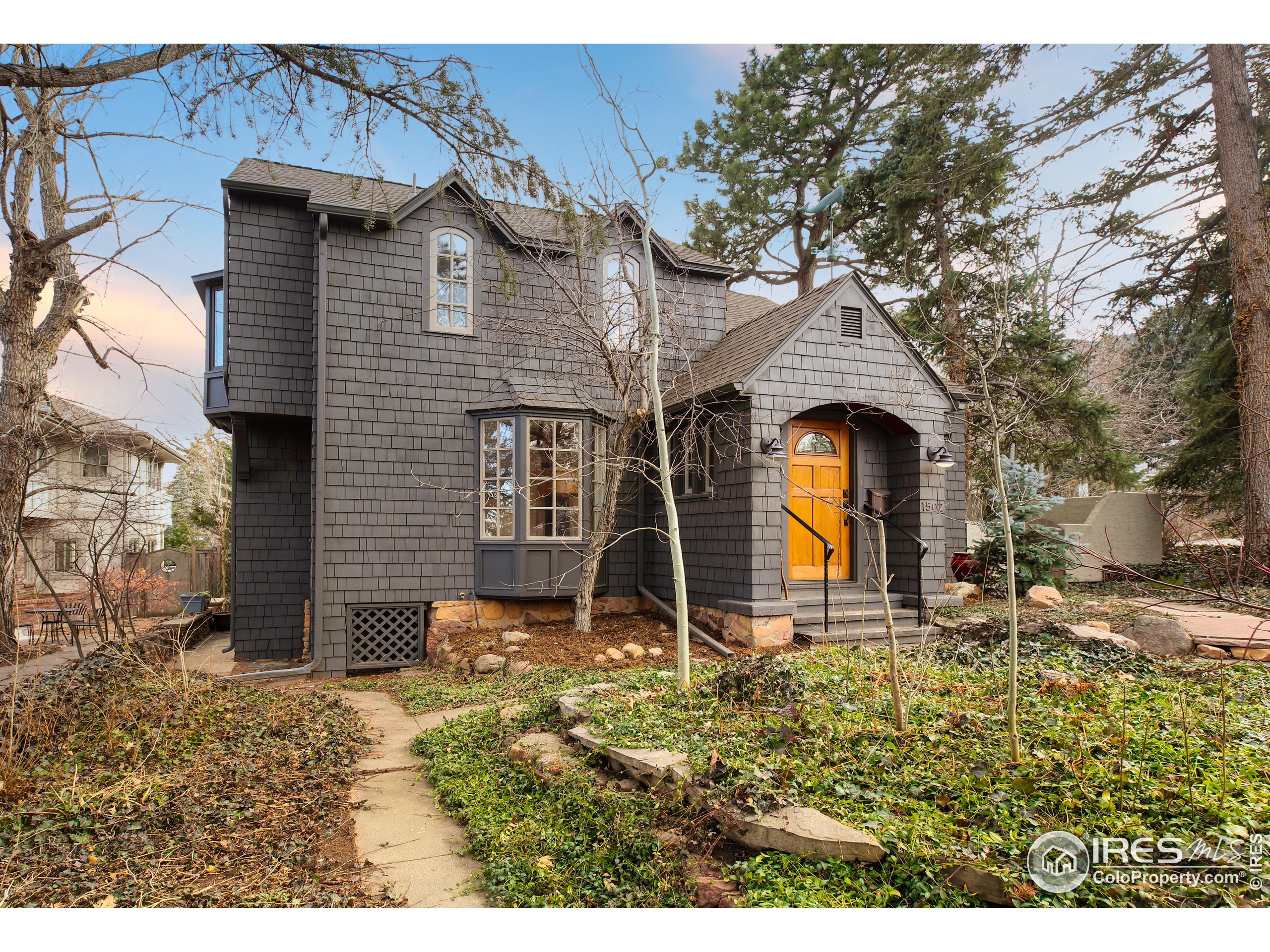 1502 Columbine Avenue Boulder, CO 80302 - Photo 1 of 35 a front view of a house with garden