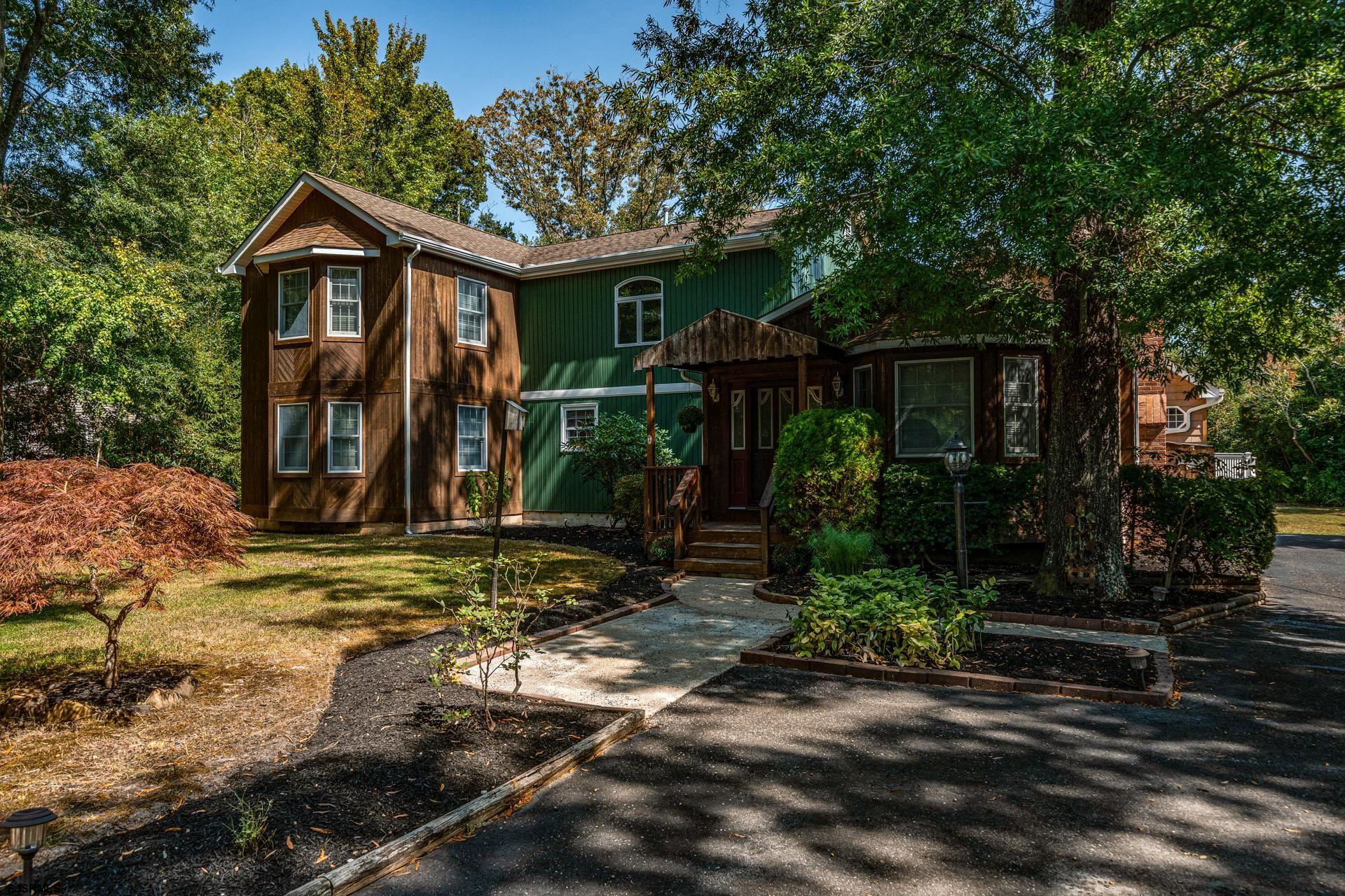 105 Tyler Road Woodbine, NJ 08270 - Photo 1 of 51 a front view of a house with garden