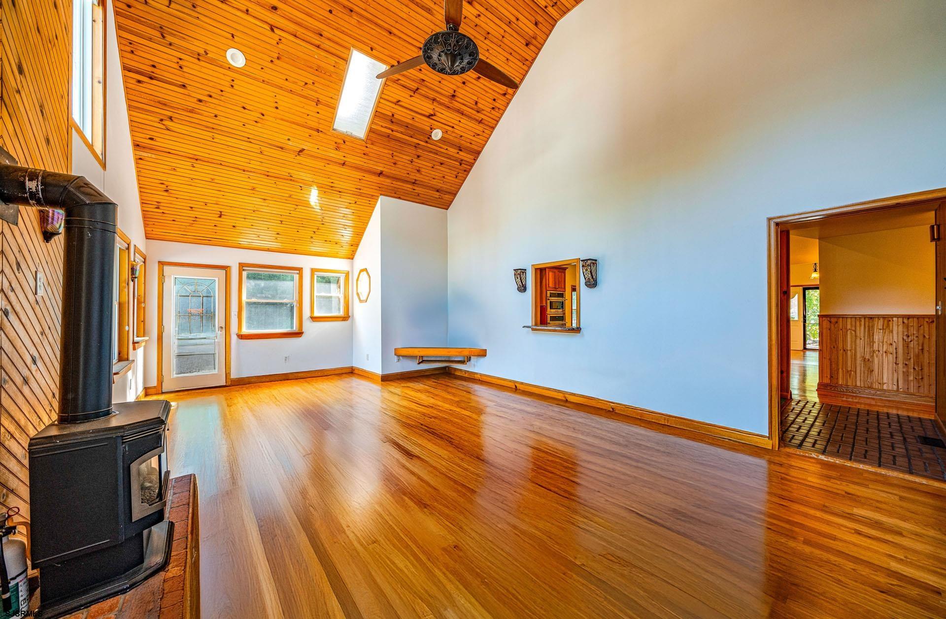 105 Tyler Road Woodbine, NJ 08270 - Photo 17 of 51 a view of an empty room with wooden floor and a window
