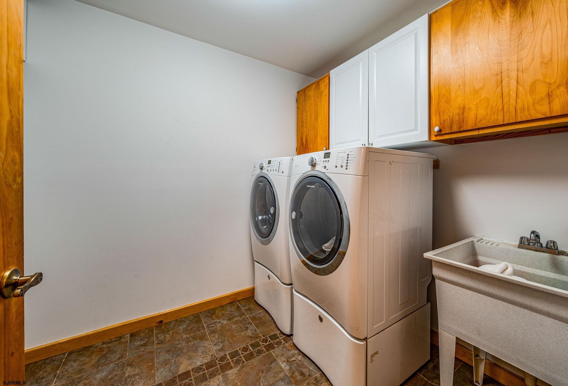105 Tyler Road Woodbine, NJ 08270 - Photo 19 of 51 a utility room with dryer and washer