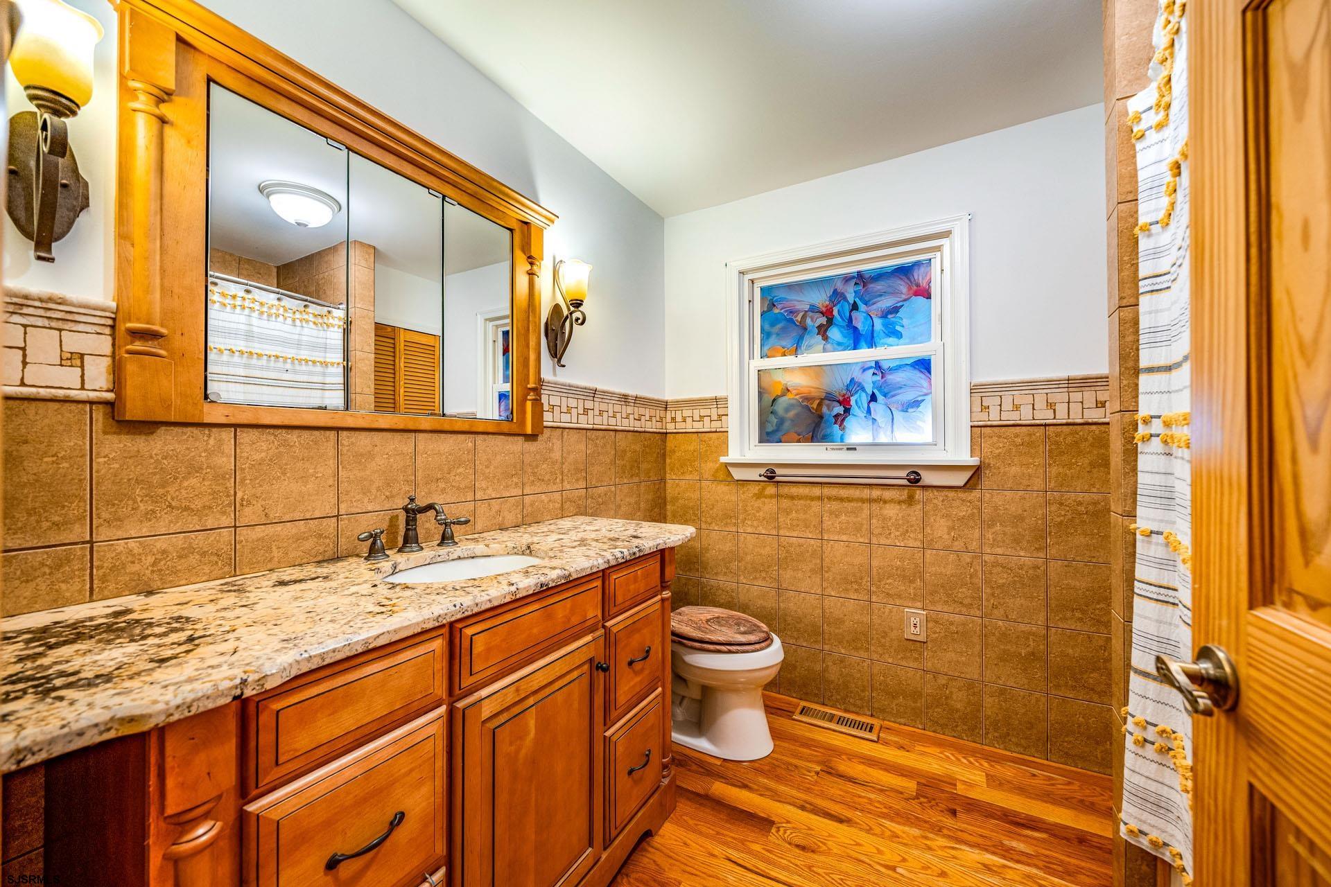 105 Tyler Road Woodbine, NJ 08270 - Photo 21 of 51 a bathroom with a sink and a mirror