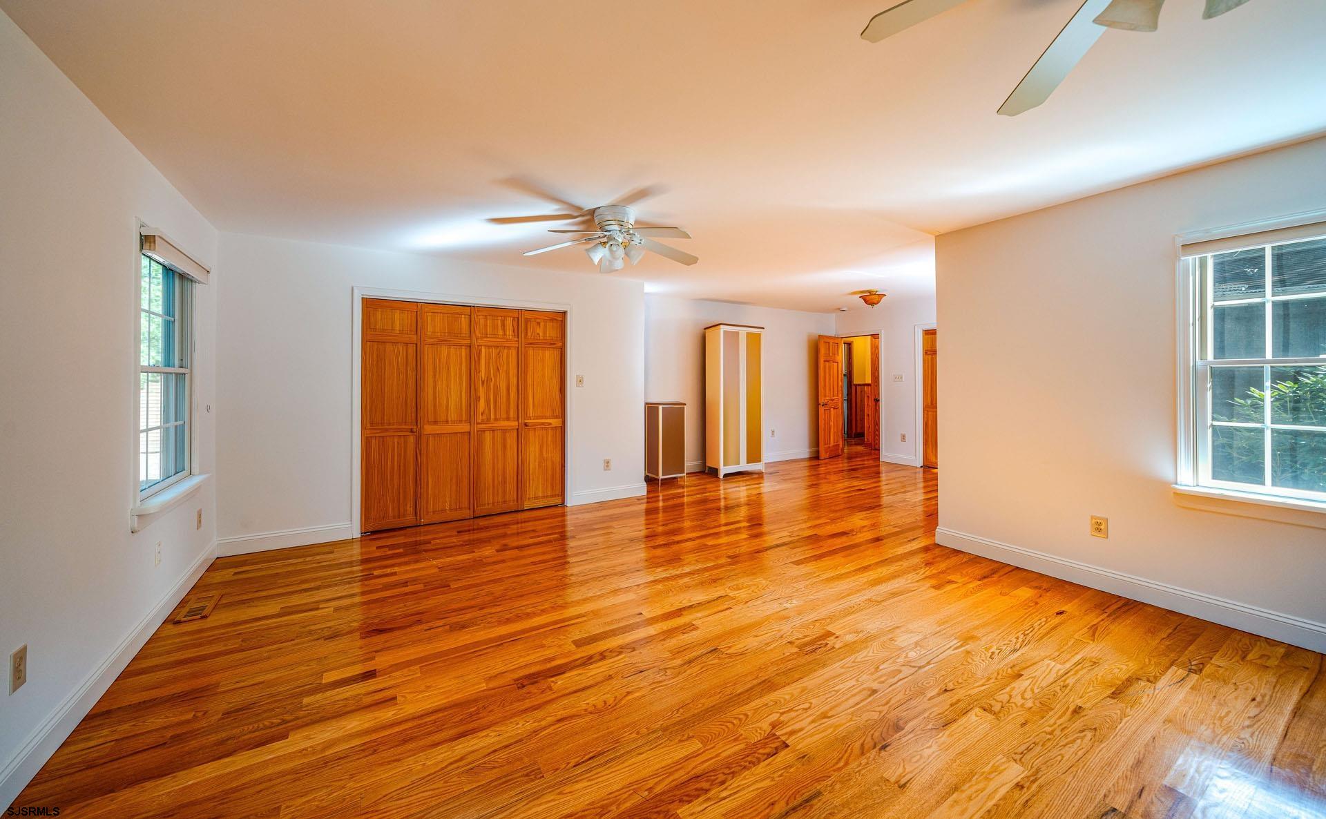 105 Tyler Road Woodbine, NJ 08270 - Photo 24 of 51 a view of an empty room with window and wooden floor