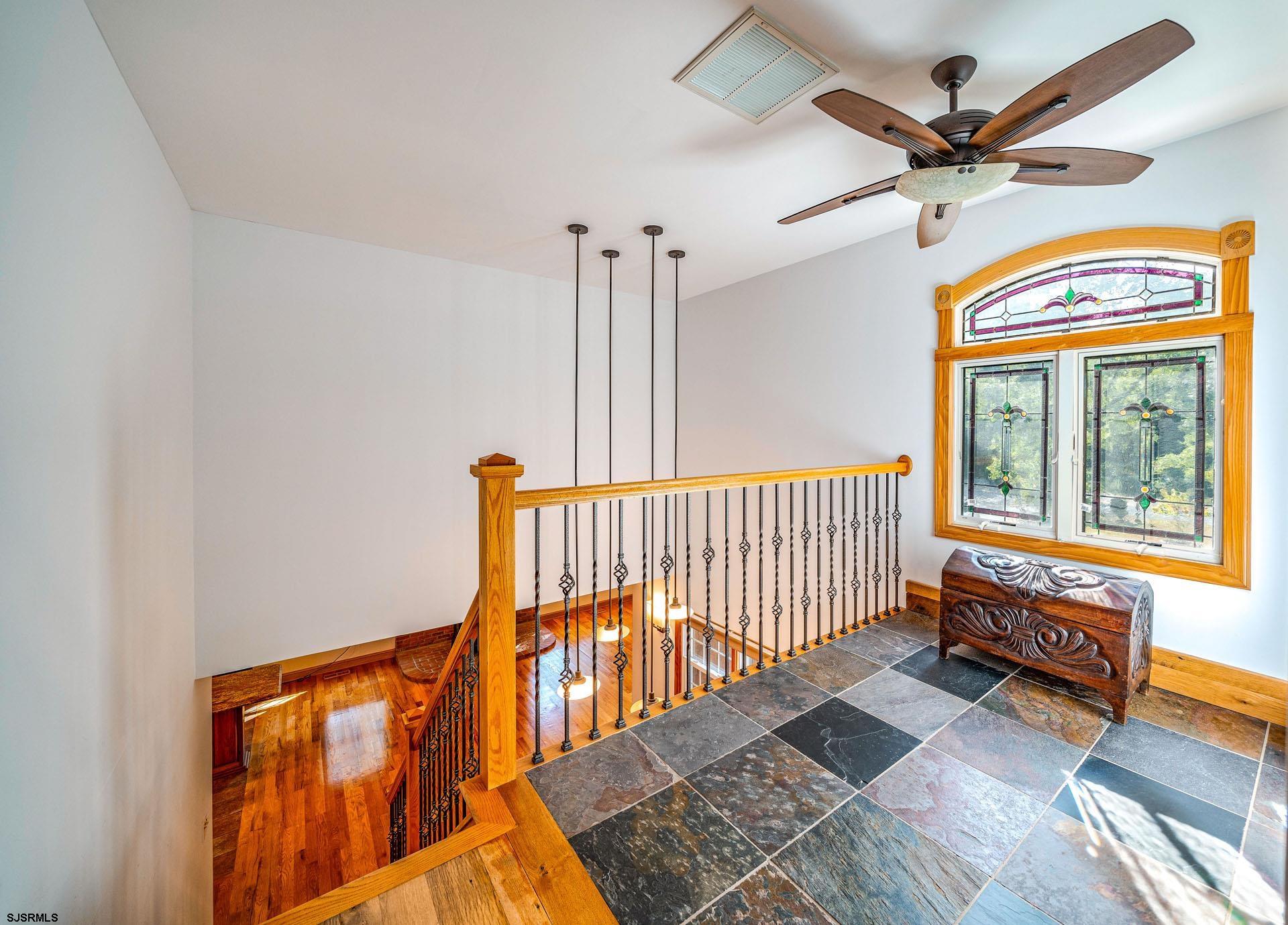 105 Tyler Road Woodbine, NJ 08270 - Photo 26 of 51 wooden floor in an empty room with a window