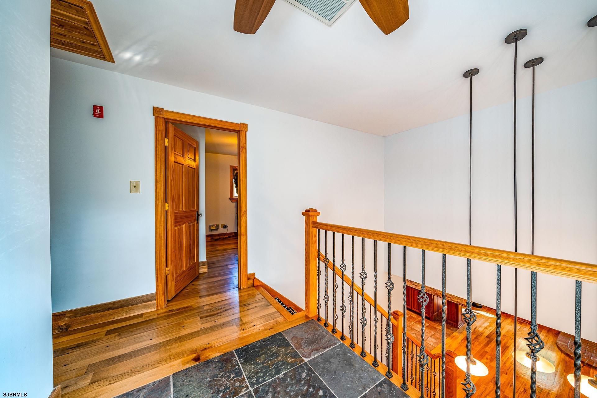 105 Tyler Road Woodbine, NJ 08270 - Photo 27 of 51 a view of a hallway with wooden floor and staircase