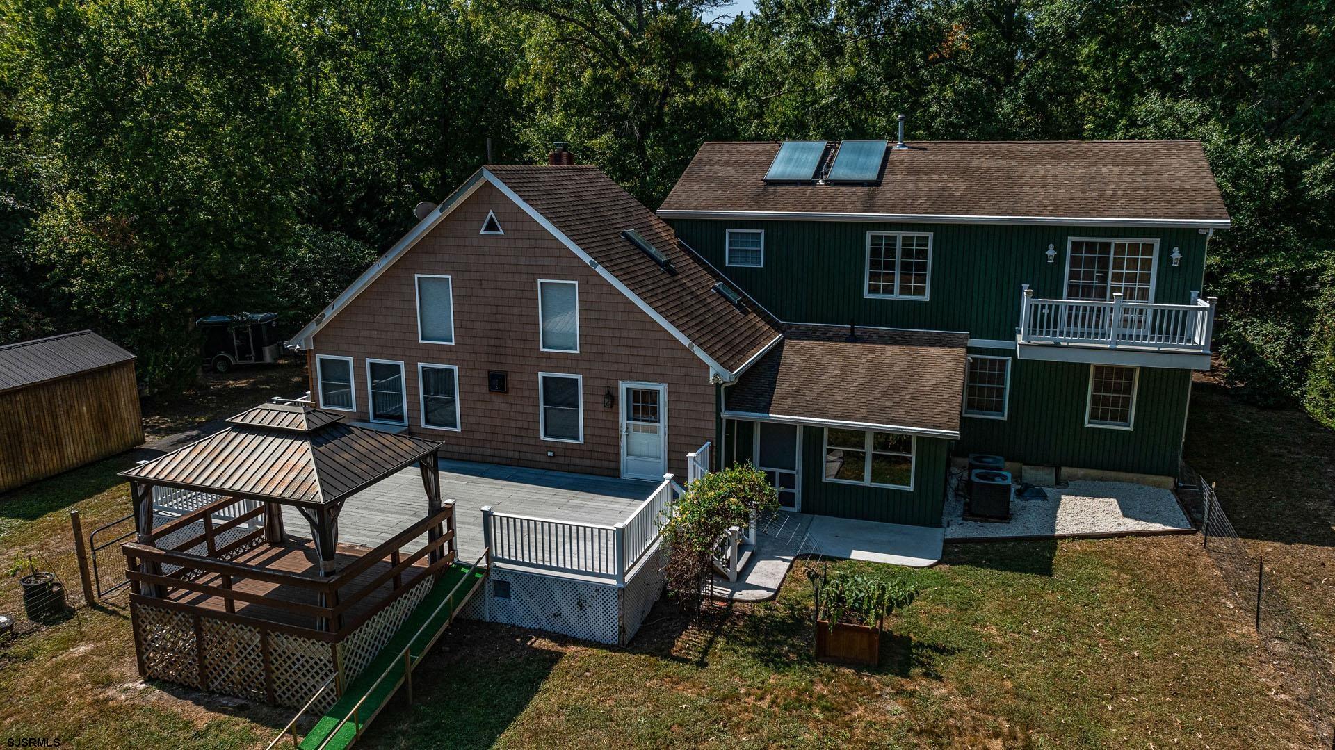 105 Tyler Road Woodbine, NJ 08270 - Photo 3 of 51 a front view of a house with garden