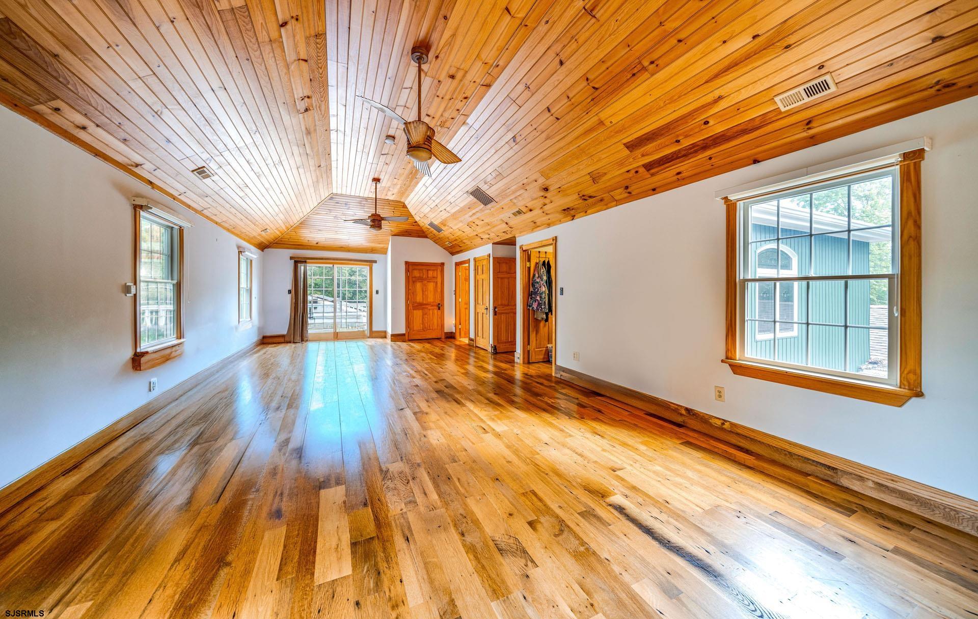 105 Tyler Road Woodbine, NJ 08270 - Photo 35 of 51 a big room with wooden floor and windows