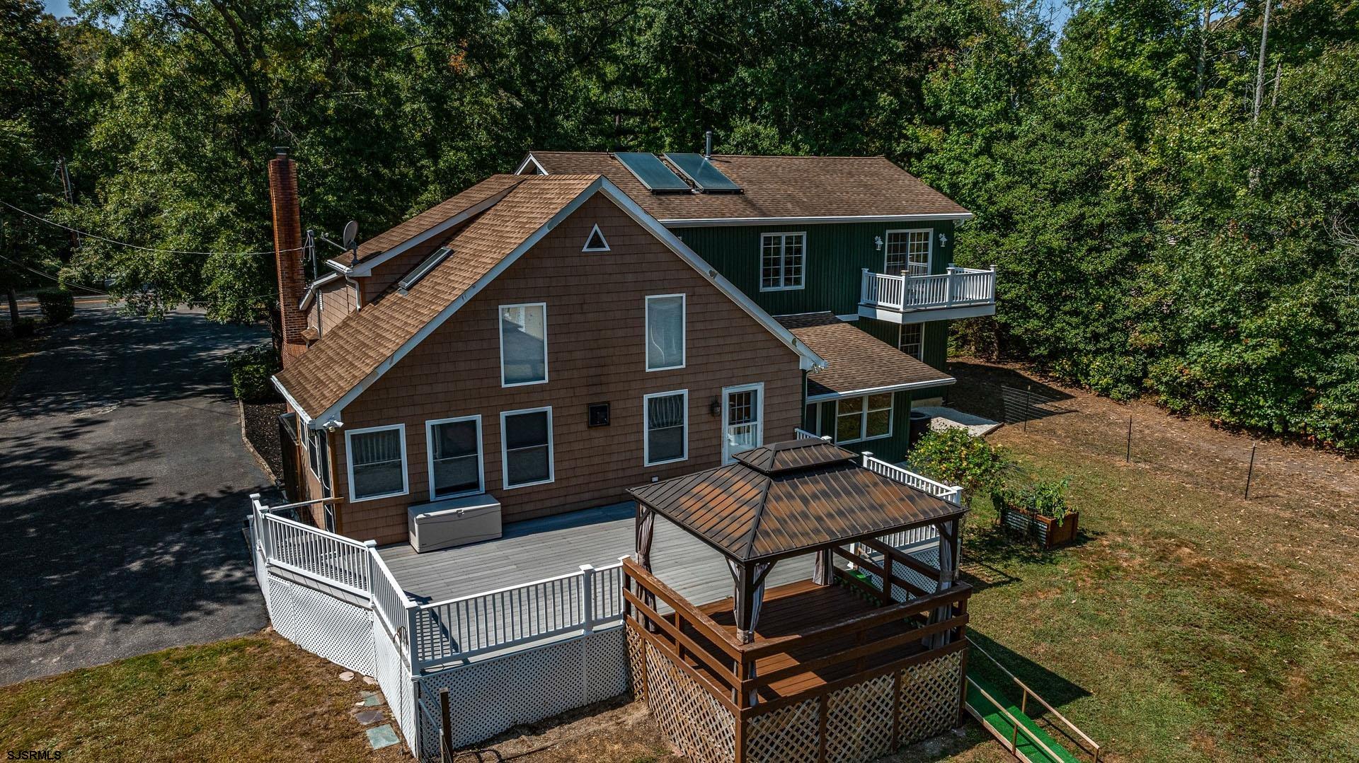 105 Tyler Road Woodbine, NJ 08270 - Photo 42 of 51 a view of a house with a roof deck front of house