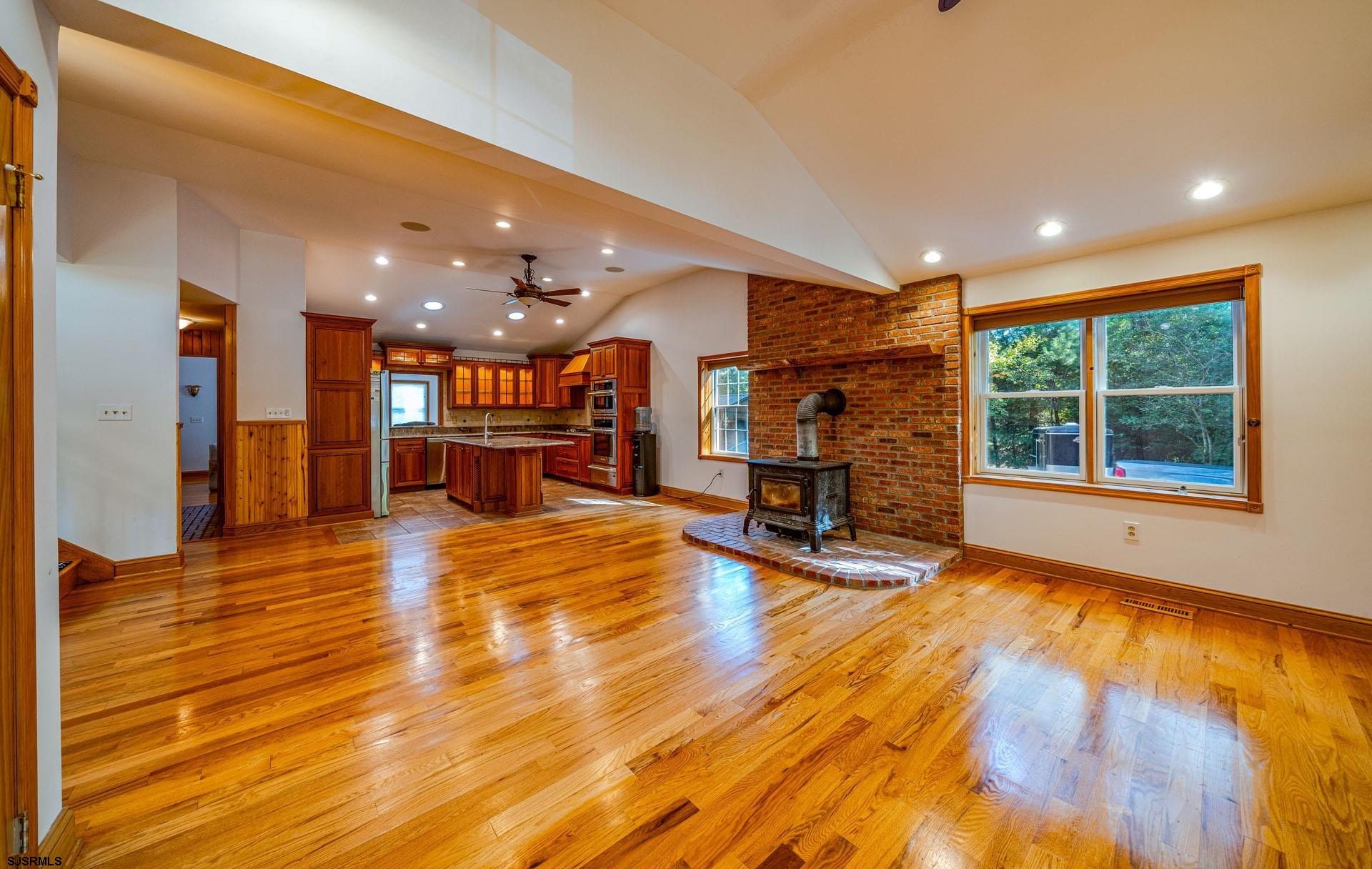 105 Tyler Road Woodbine, NJ 08270 - Photo 9 of 51 a view of a living room with kitchen and hardwood floor