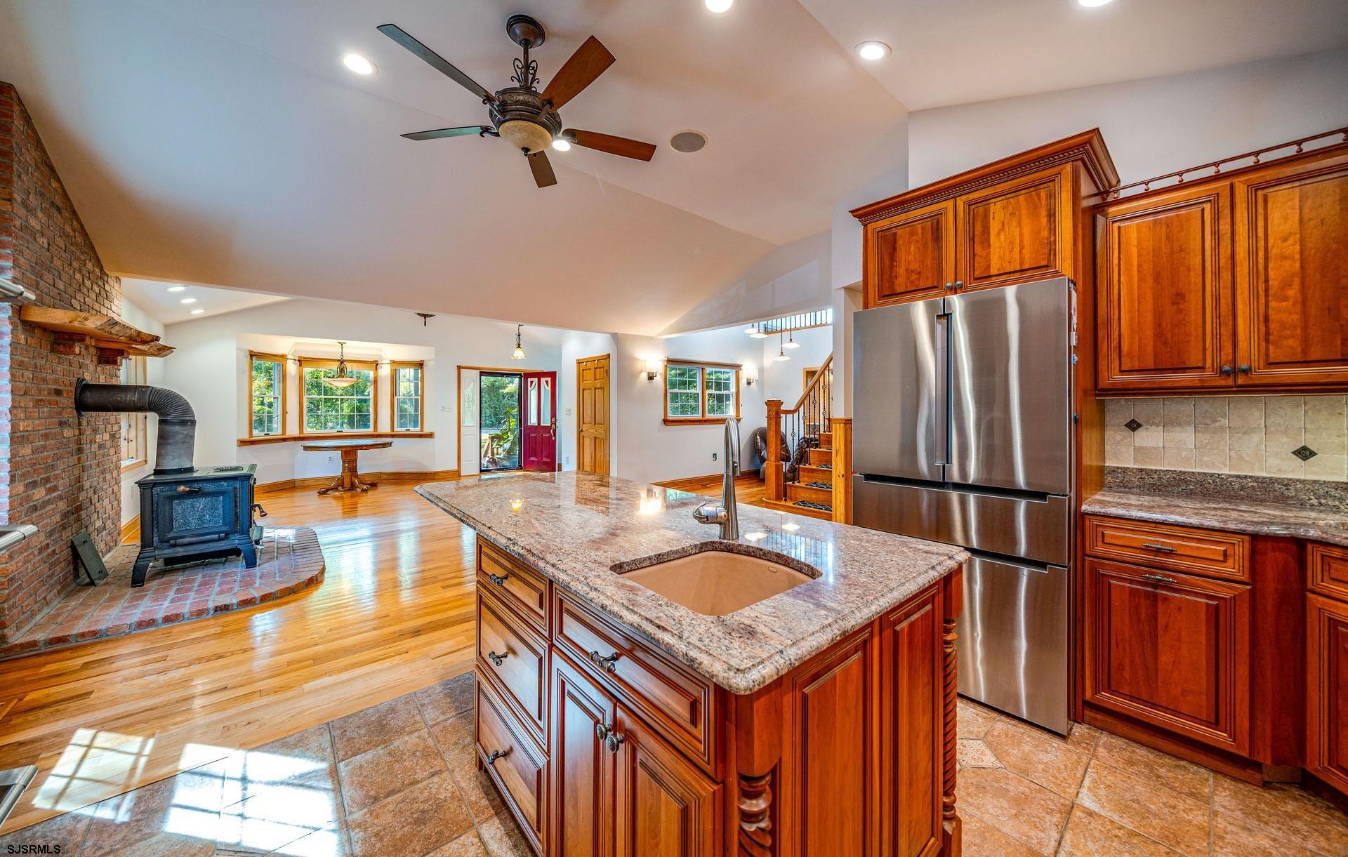 105 Tyler Road Woodbine, NJ 08270 - Photo 10 of 51 a kitchen with stainless steel appliances granite countertop a refrigerator a stove and a sink