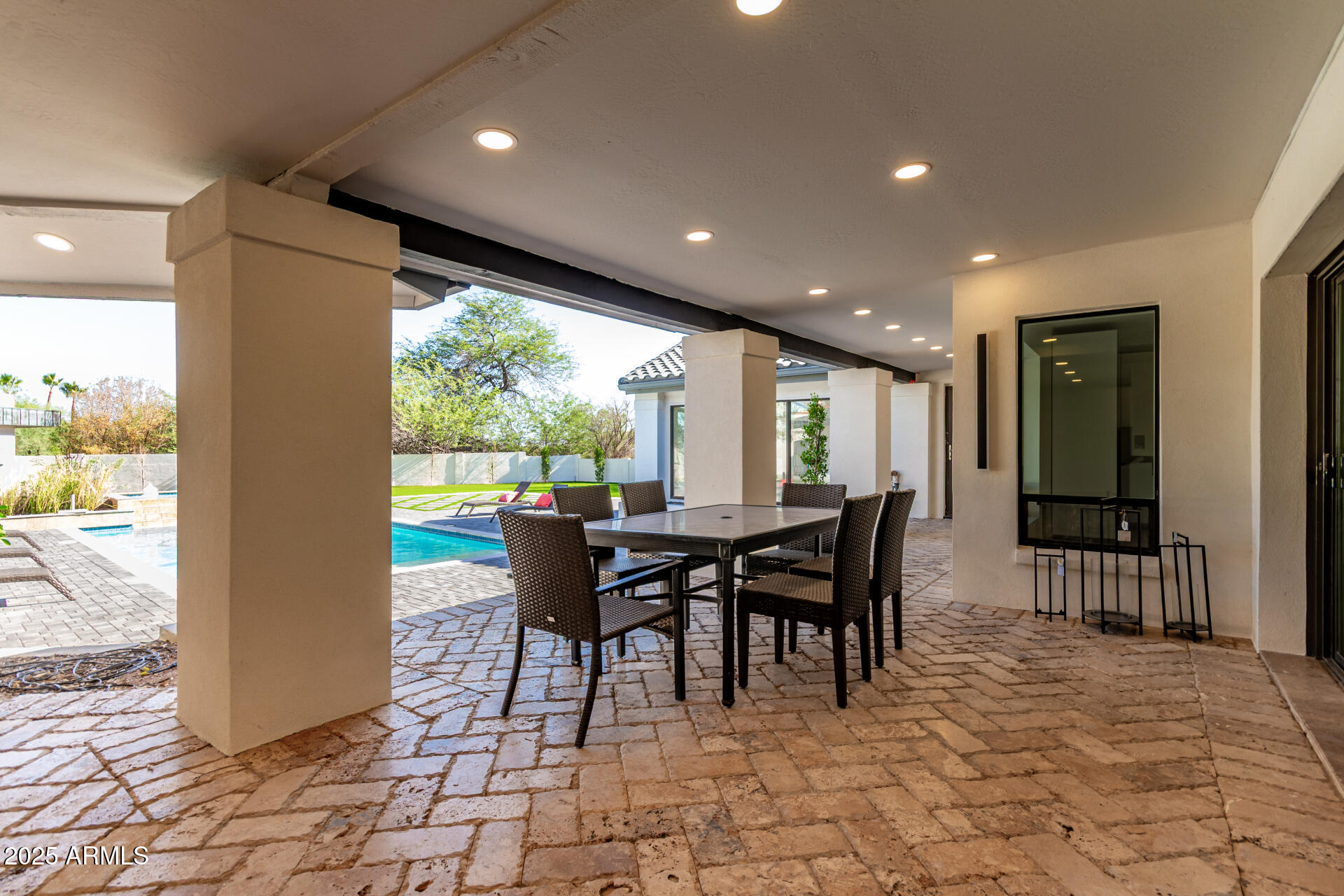 3301 East Rovey Avenue Paradise Valley, AZ 85253 - Photo 102 of 105 a view of a big dining room with furniture window and outside view