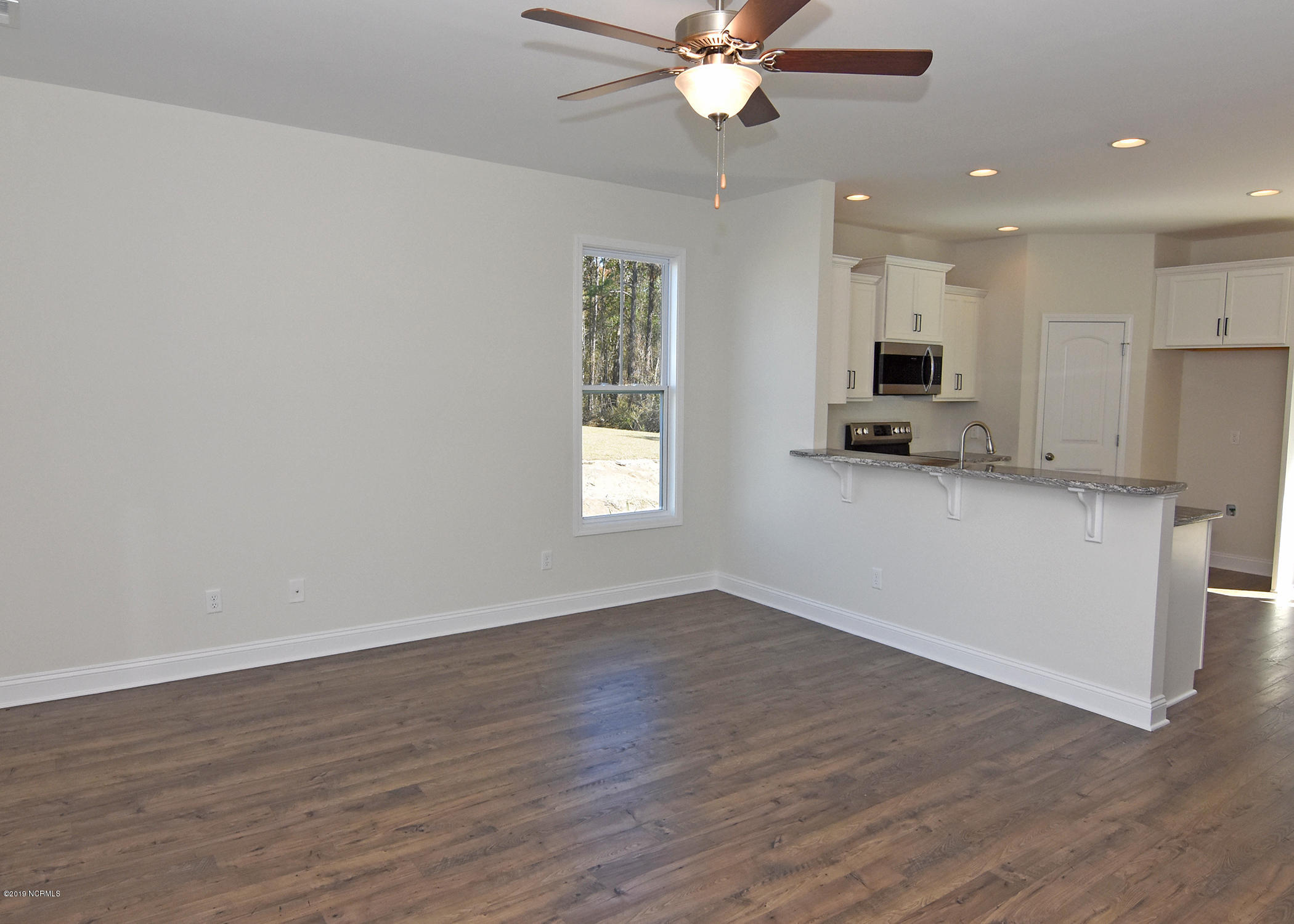 421 Lehigh Road Wilmington, NC 28412 - Photo 6 of 12 Family and Kitchen