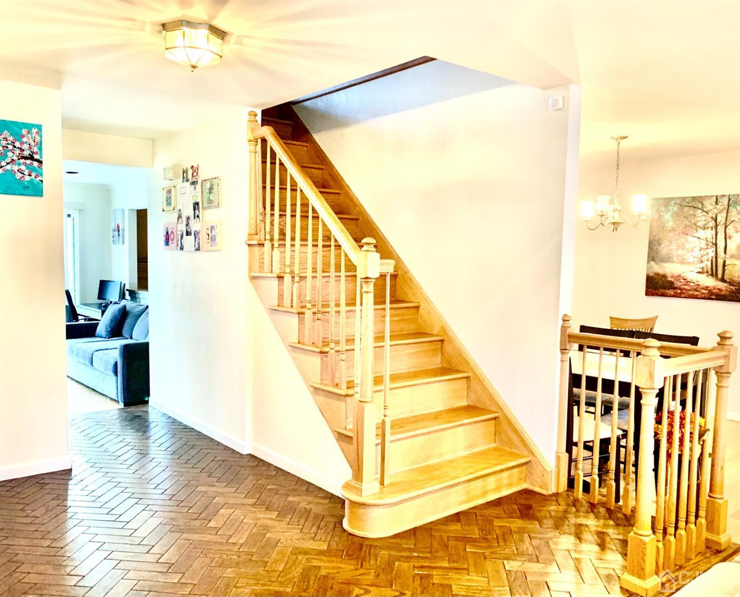 1001 Timber Oaks Road, Unit 1001 Edison, NJ 08820 - Photo 21 of 25 a view of entryway and hall with wooden floor