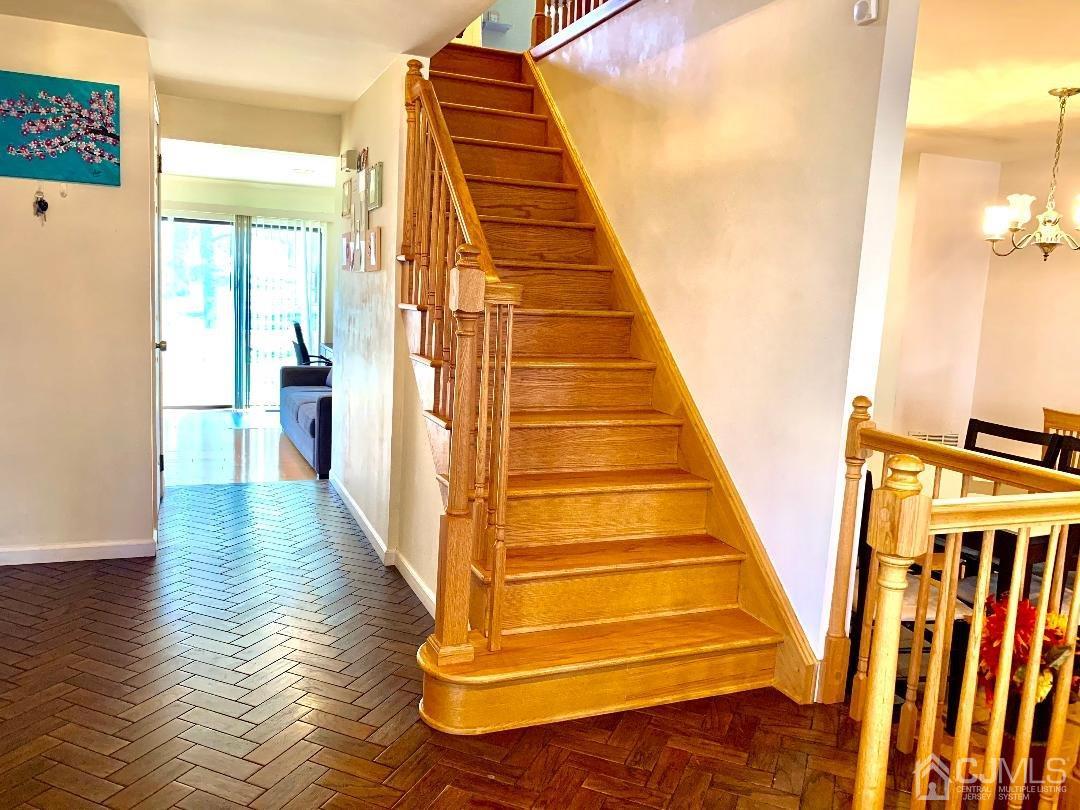1001 Timber Oaks Road, Unit 1001 Edison, NJ 08820 - Photo 25 of 25 a view of entryway with wooden floor