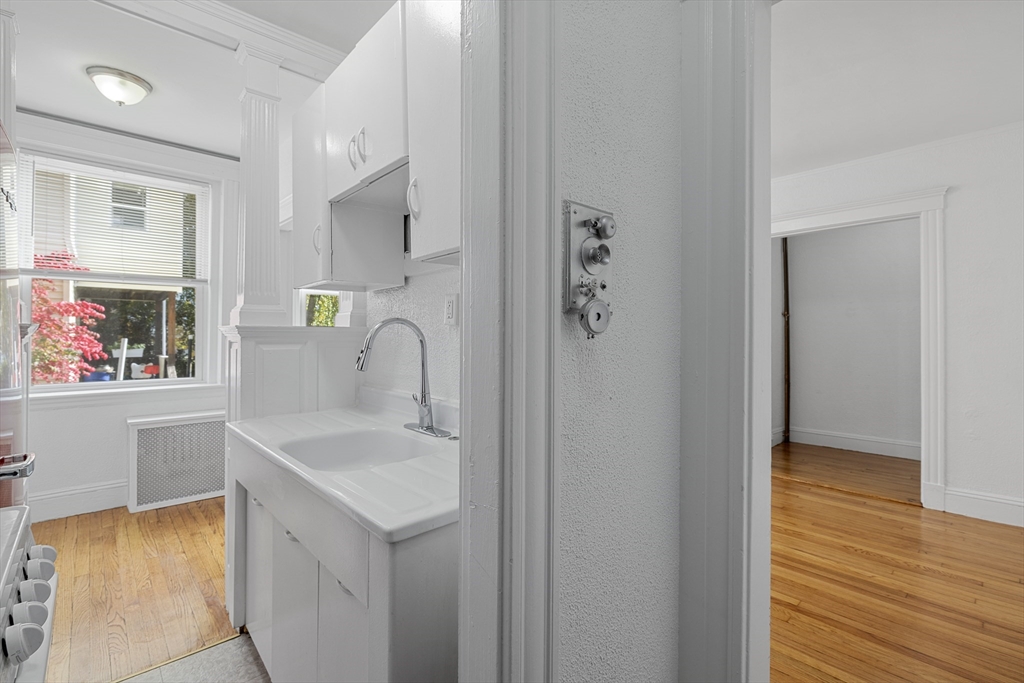 170 Maple Street, Unit 110 Malden, MA 02148 - Photo 15 of 23 a bathroom with a sink and a bathtub
