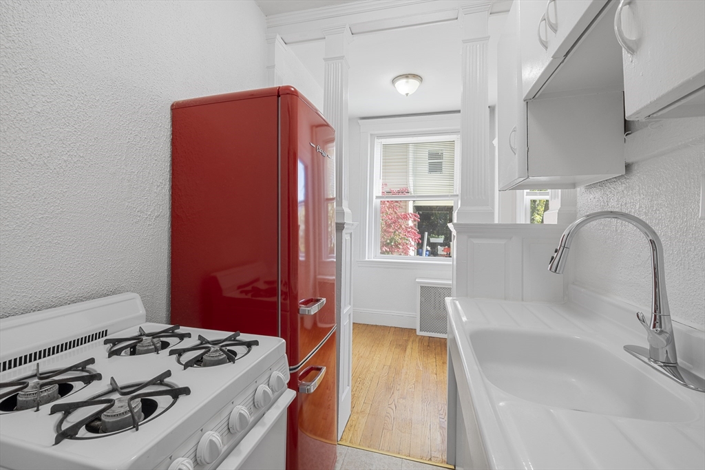 170 Maple Street, Unit 110 Malden, MA 02148 - Photo 17 of 23 a bathroom with a sink and a bathtub