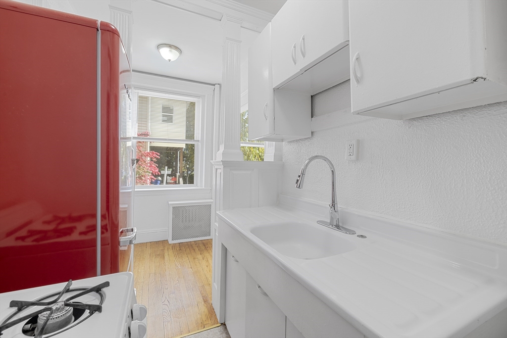 170 Maple Street, Unit 110 Malden, MA 02148 - Photo 18 of 23 a view of bathroom with dual sinks