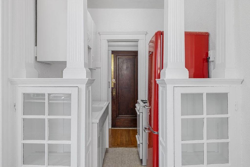 170 Maple Street, Unit 110 Malden, MA 02148 - Photo 19 of 23 a view of walk in closet with empty racks