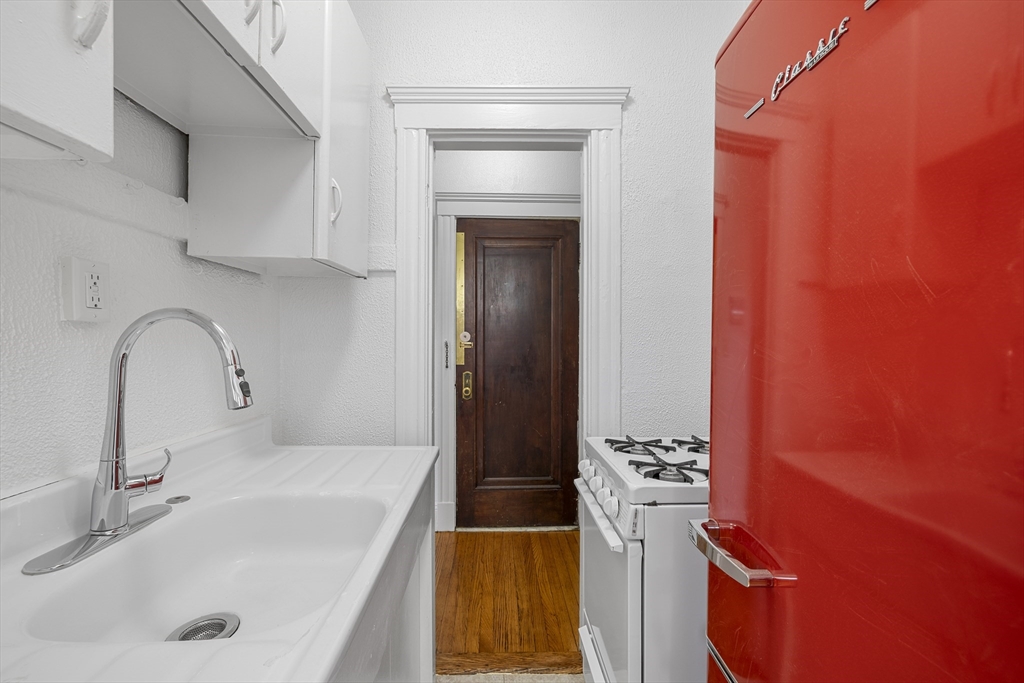 170 Maple Street, Unit 110 Malden, MA 02148 - Photo 20 of 23 a bathroom with a sink and a tub