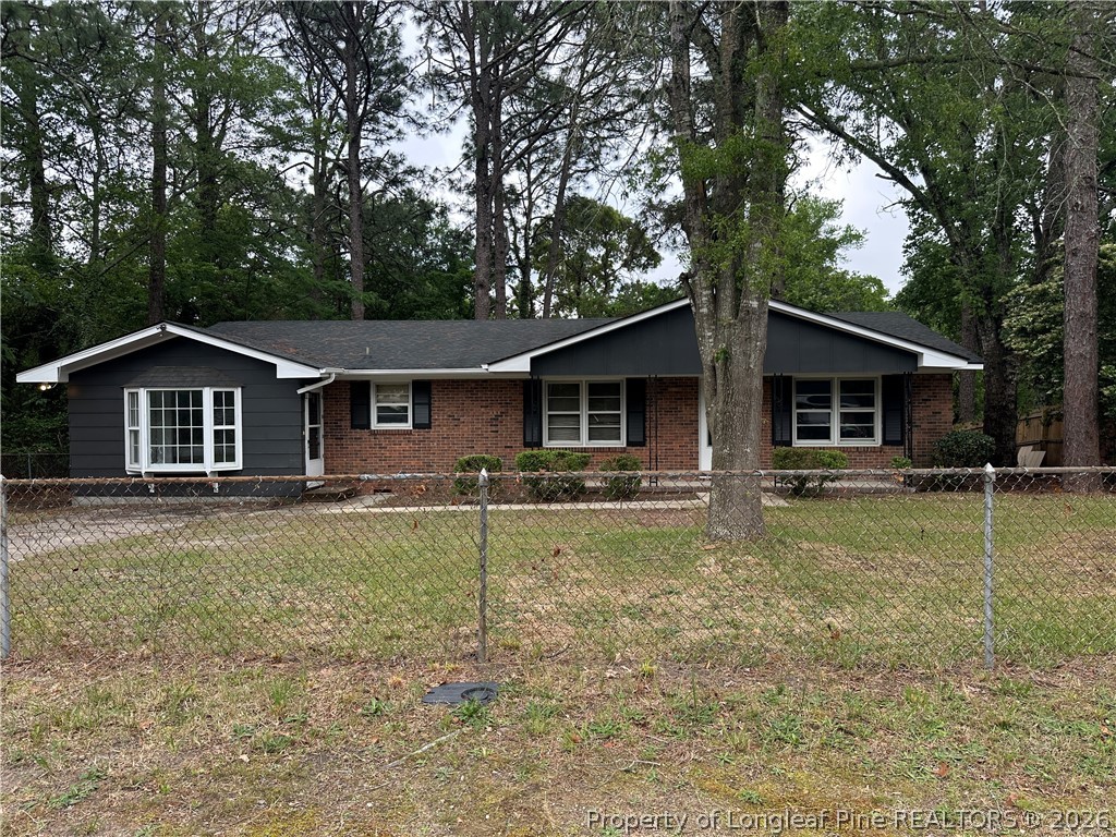 1404 Hibiscus Road Fayetteville, NC 28311 - Photo 1 of 10 a view of house with a yard