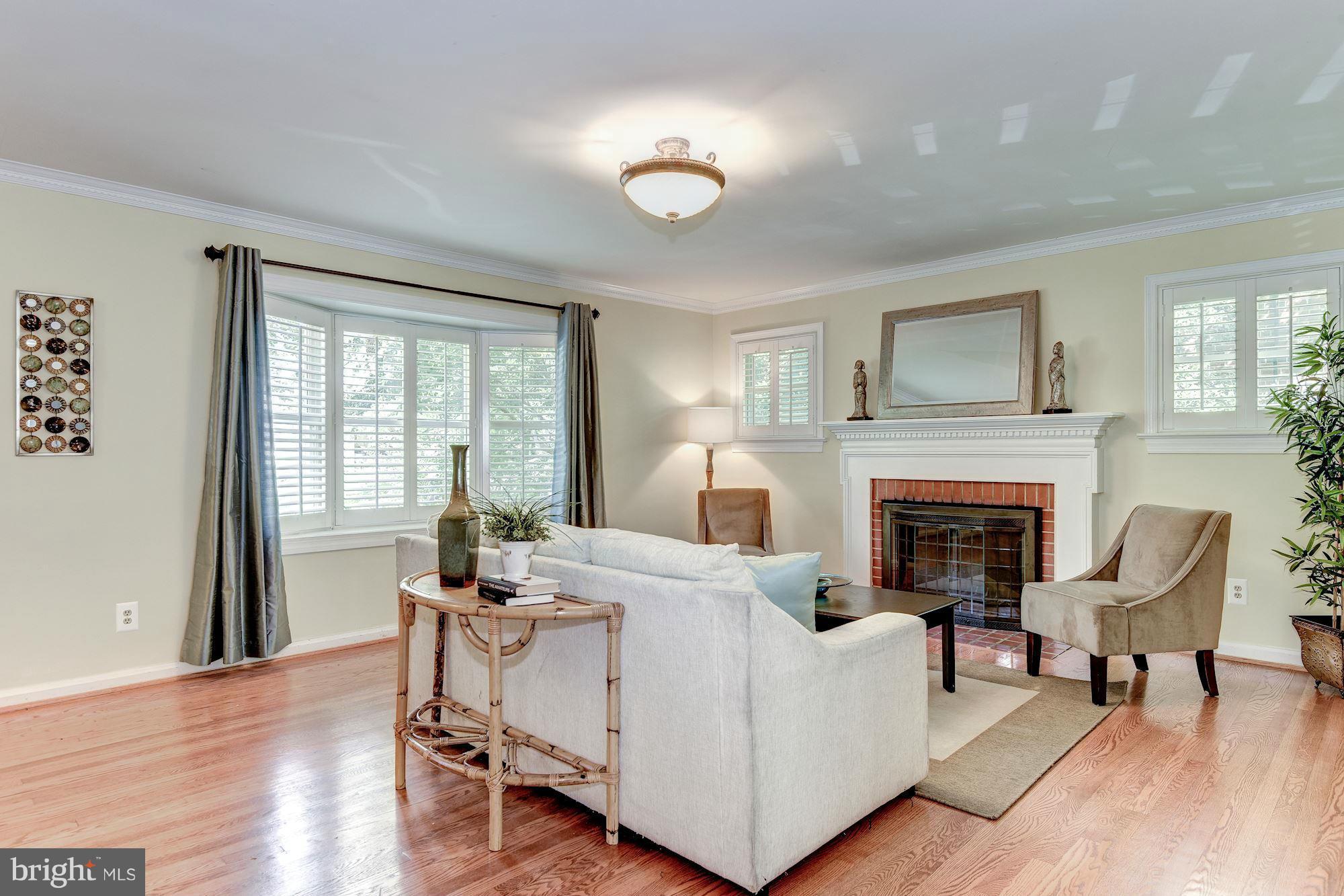 8807 Walnut Hill Road Chevy Chase, MD 20815 - Photo 3 of 21 Wood burning fireplace, bay window