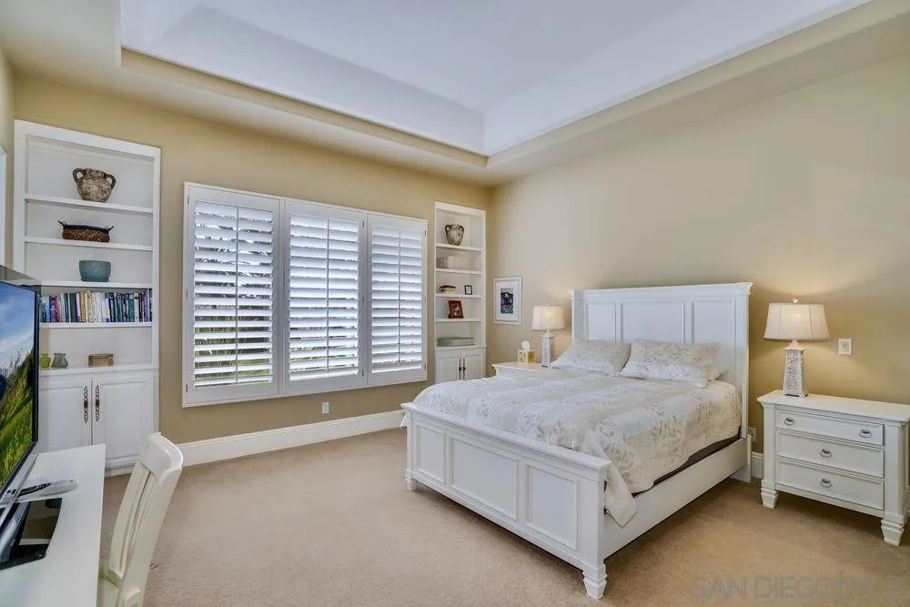 7745 St Andrews Road Rancho Santa Fe, CA 92067 - Photo 20 of 29 a bedroom with a bed and a window