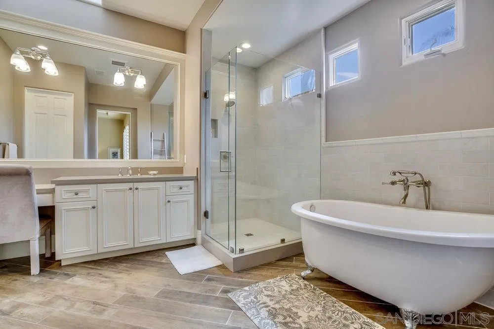 7745 St Andrews Road Rancho Santa Fe, CA 92067 - Photo 21 of 29 a bathroom with a bathtub and shower