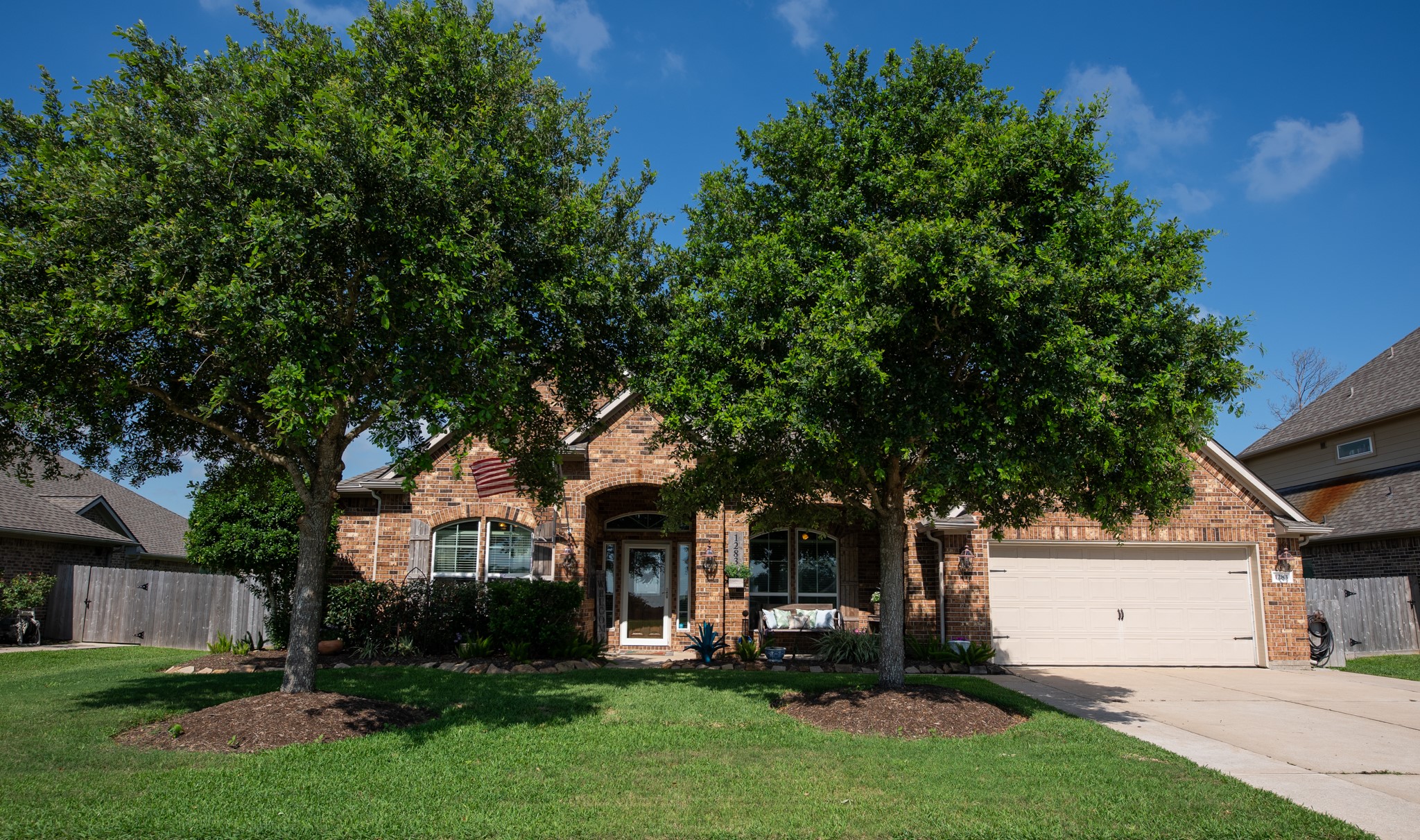 1283 Laurel Lane Angleton, TX 77515 - Photo 3 of 40 Mature trees provide a shaded front yard