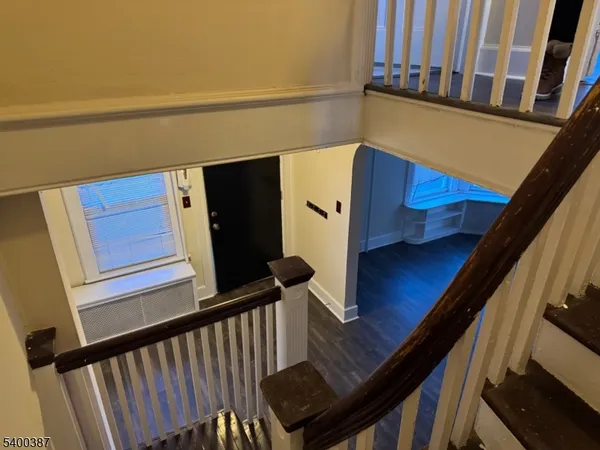 a view of balcony with furniture