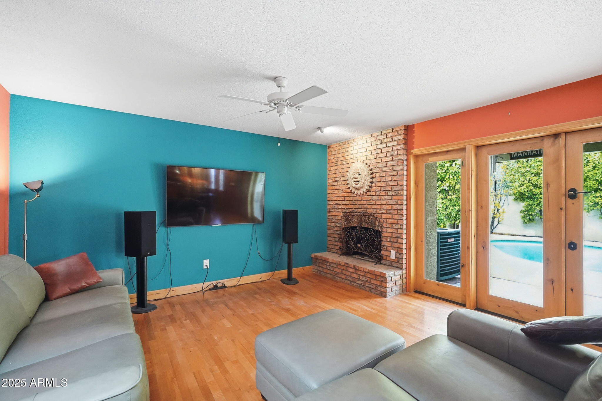 1608 East Edgewater Drive Tempe, AZ 85283 - Photo 13 of 47 a bedroom with a large bed and a flat screen tv