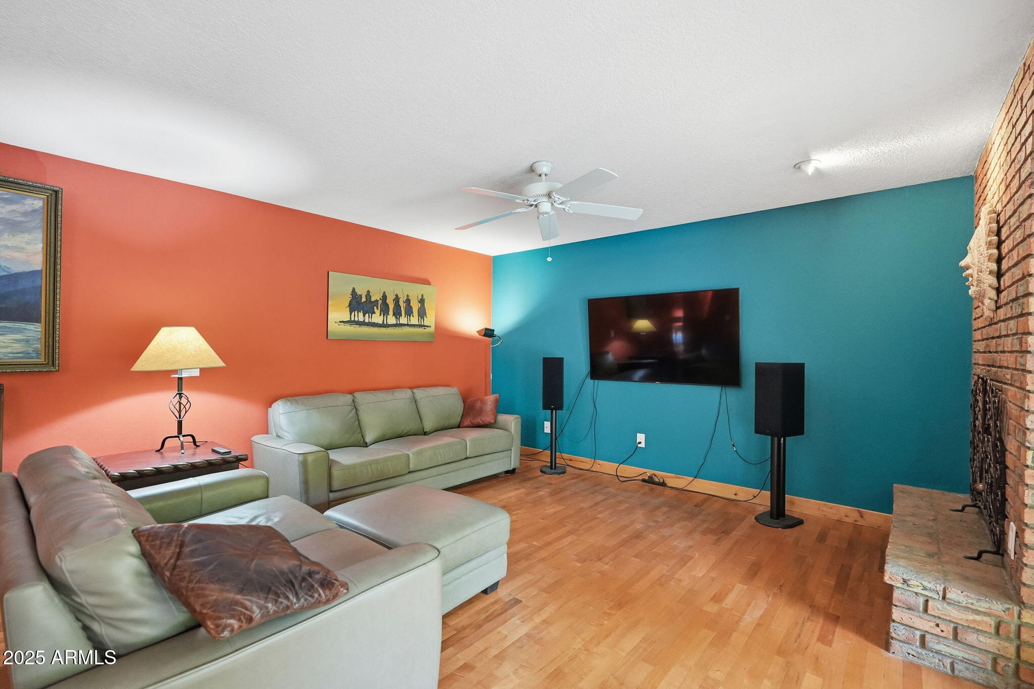 1608 East Edgewater Drive Tempe, AZ 85283 - Photo 24 of 47 a living room with furniture and a flat screen tv
