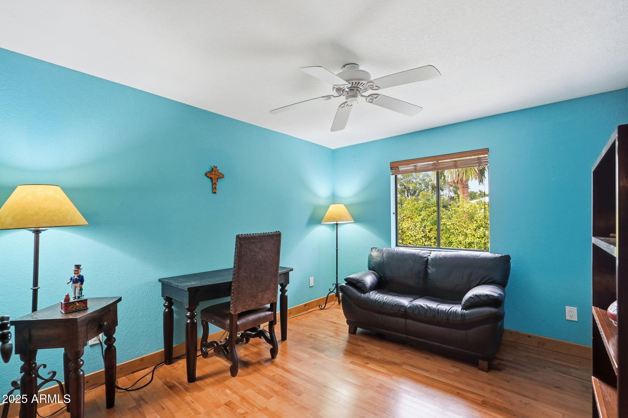 1608 East Edgewater Drive Tempe, AZ 85283 - Photo 31 of 47 a living room with furniture and a wooden floor