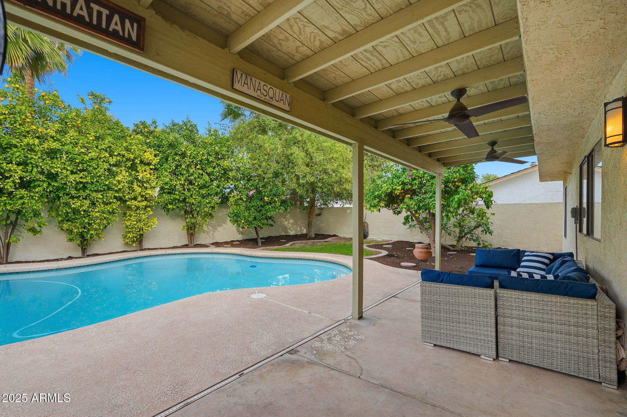 1608 East Edgewater Drive Tempe, AZ 85283 - Photo 44 of 47 a view of backyard with swimming pool and outdoor seating