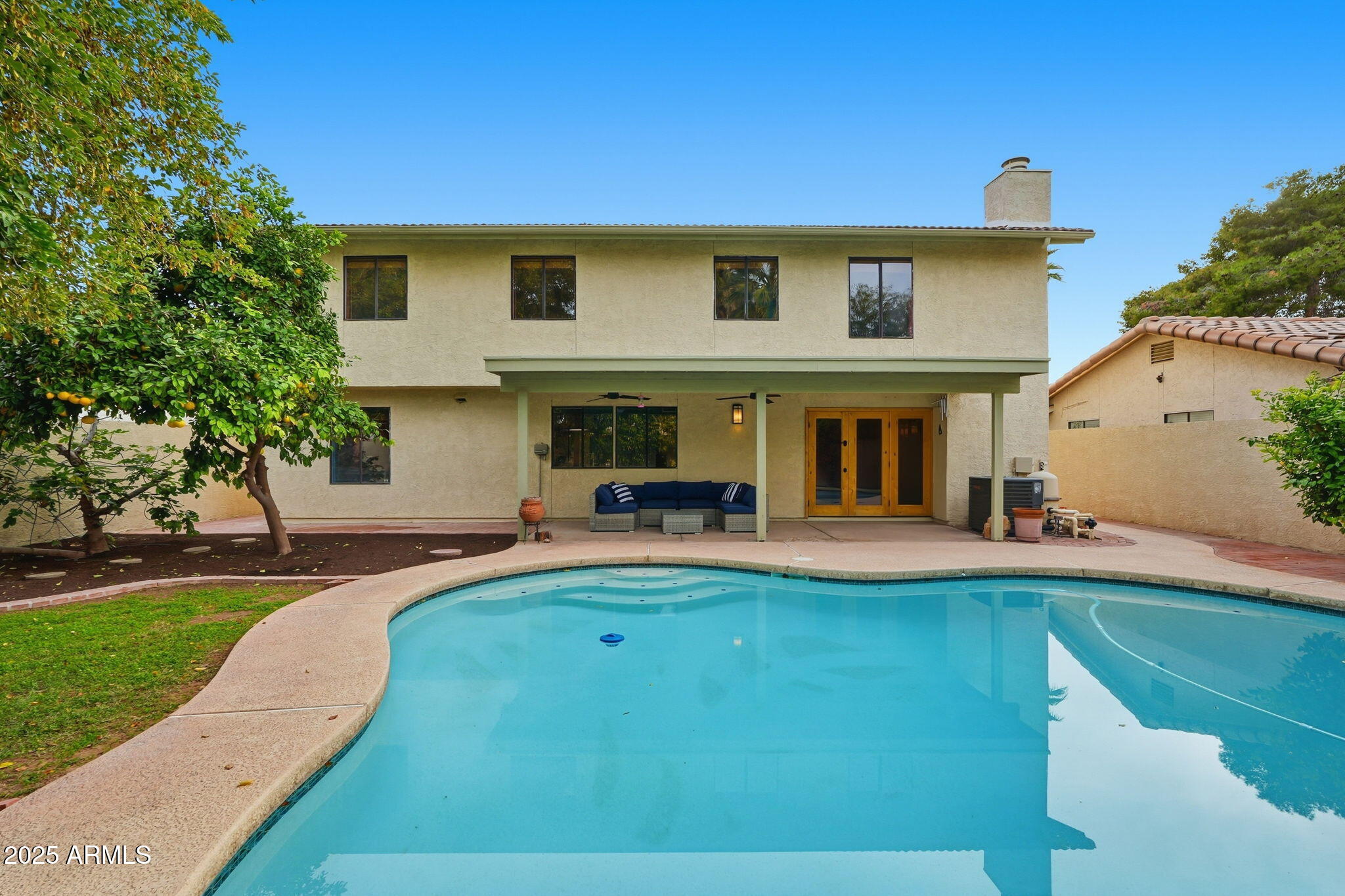 1608 East Edgewater Drive Tempe, AZ 85283 - Photo 46 of 47 a front view of a house with a yard