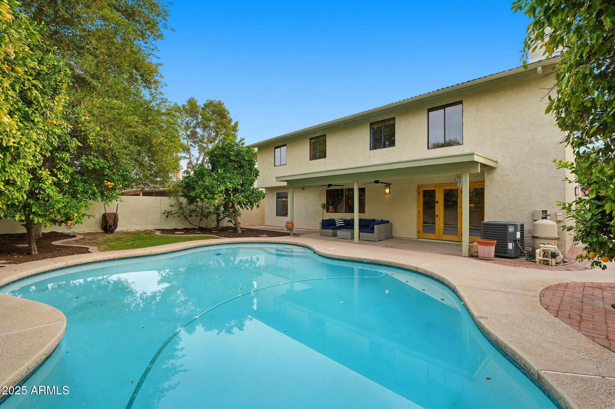 1608 East Edgewater Drive Tempe, AZ 85283 - Photo 6 of 47 a view of a house with swimming pool and sitting area