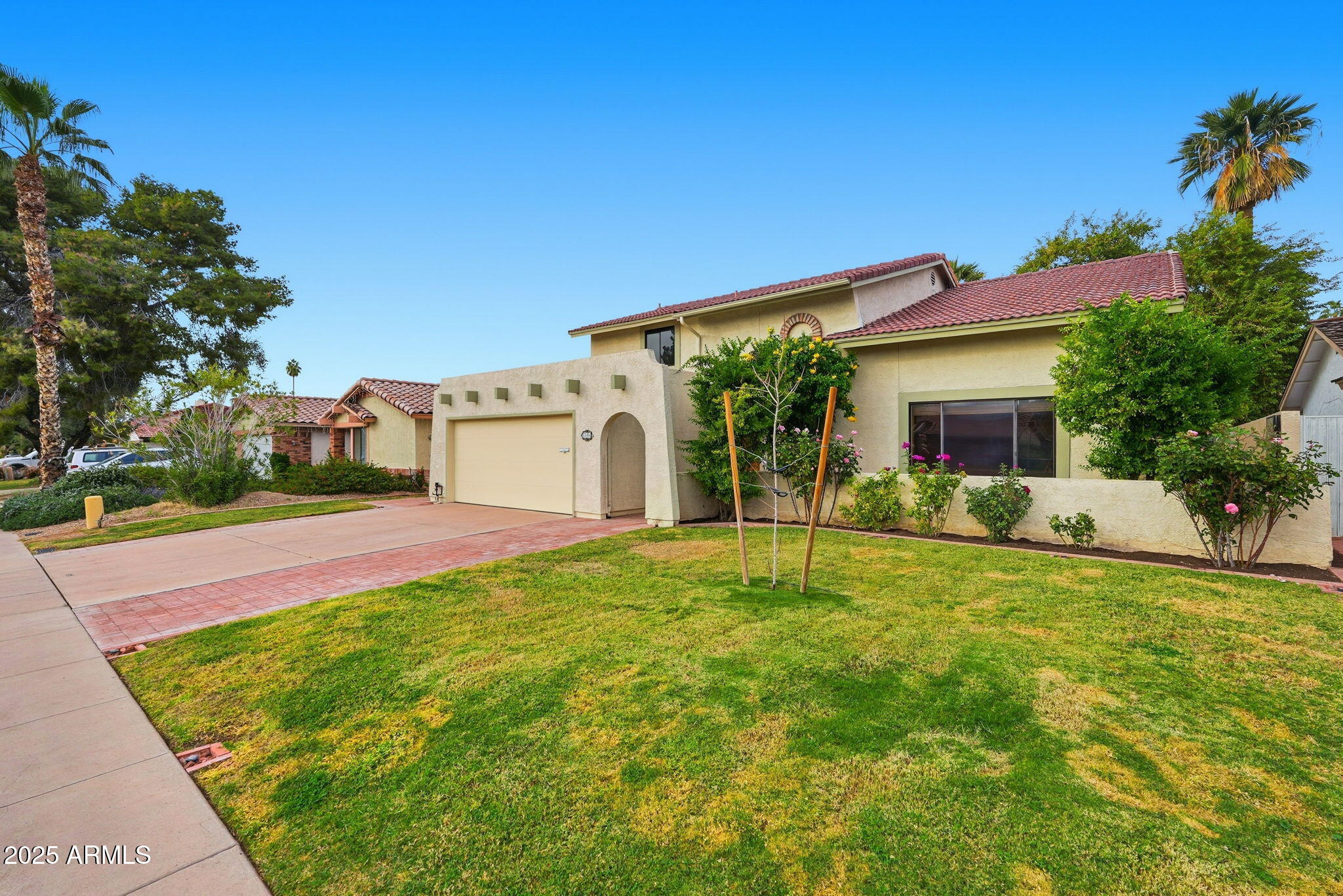 1608 East Edgewater Drive Tempe, AZ 85283 - Photo 8 of 47 a view of a house with a yard and tree