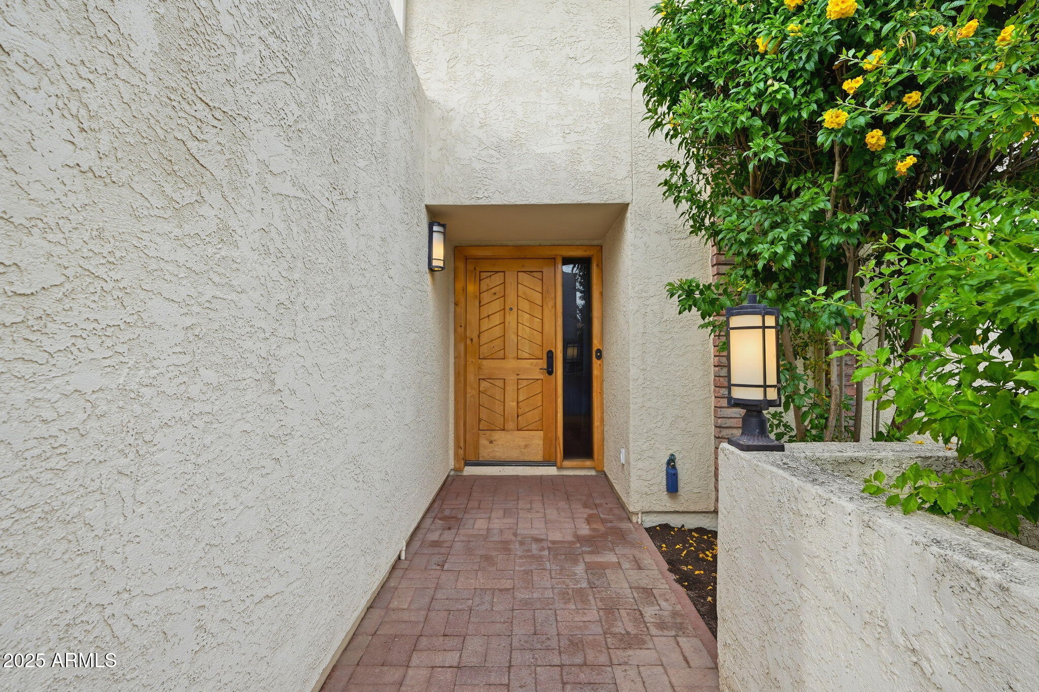 1608 East Edgewater Drive Tempe, AZ 85283 - Photo 9 of 47 a view of a house with a pathway