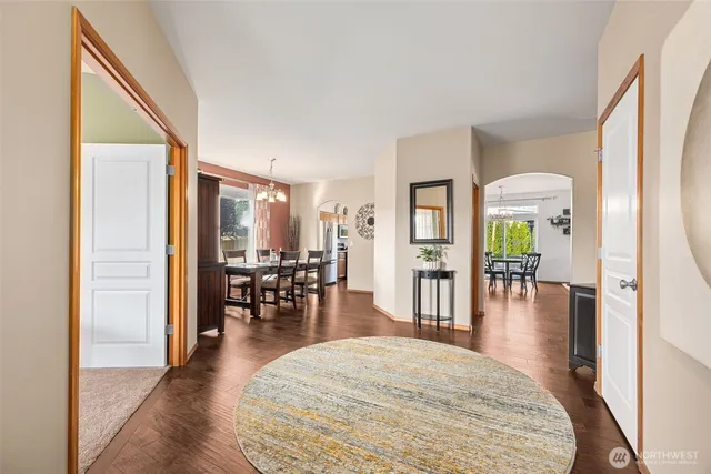a living room with furniture and a table