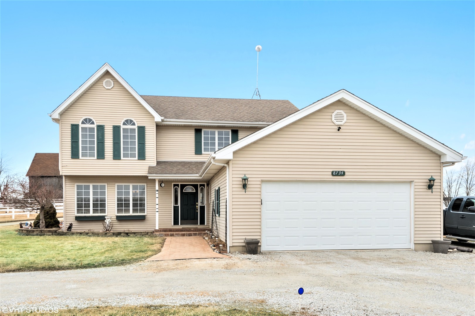 8734 West Offner Road Monee, IL 60449 - Photo 2 of 33 a view of a house with a yard and garage