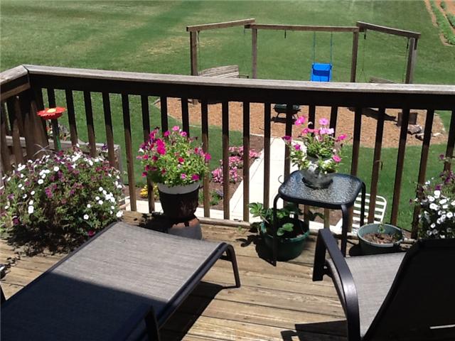 3441 Pleasant Grove Road White House, TN 37188 - Photo 19 of 20 Separate entrance to the upstairs. Enough room for a chair or two!