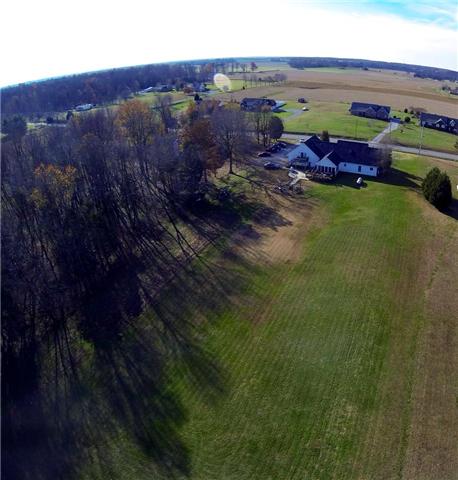 3441 Pleasant Grove Road White House, TN 37188 - Photo 3 of 20 What a rare find in White House -Huge flat back yard with no houses behind you. Ton of room for the kids to just be kids and run and play, Garden already started!