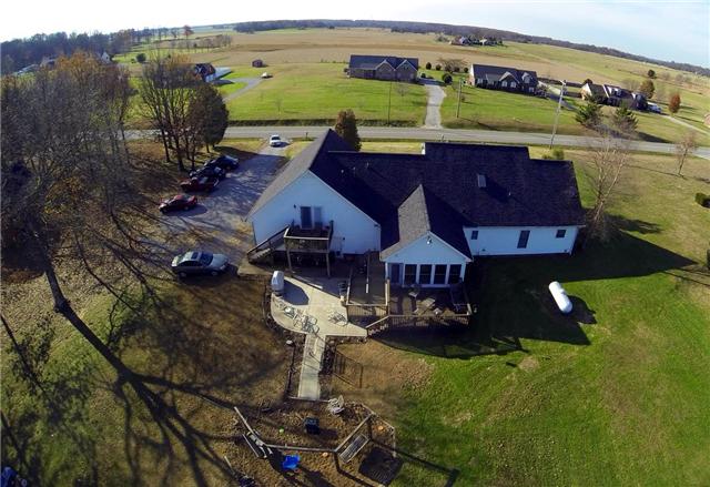 3441 Pleasant Grove Road White House, TN 37188 - Photo 4 of 20 Enjoy the views of this backyard in the awesome Custom Sun Room with vaulted ceilings. Plenty of parking, 2 decks for entertaining and separate entrance if you would like a mother in law suite. This home has it all!