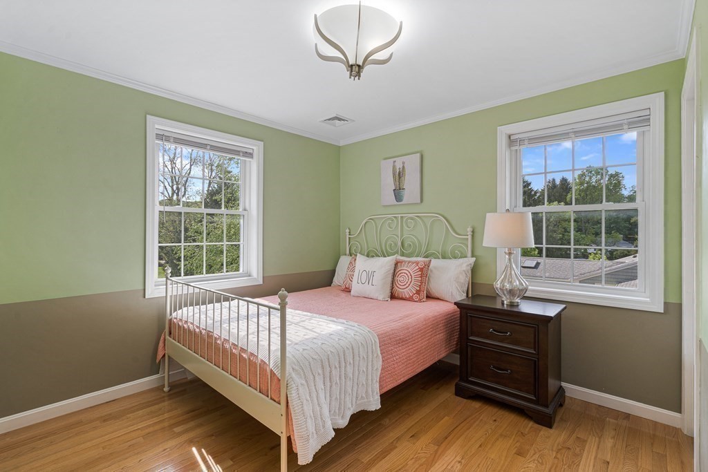146 Ridge Street Winchester, MA 01890 - Photo 20 of 40 a bedroom with a bed and window